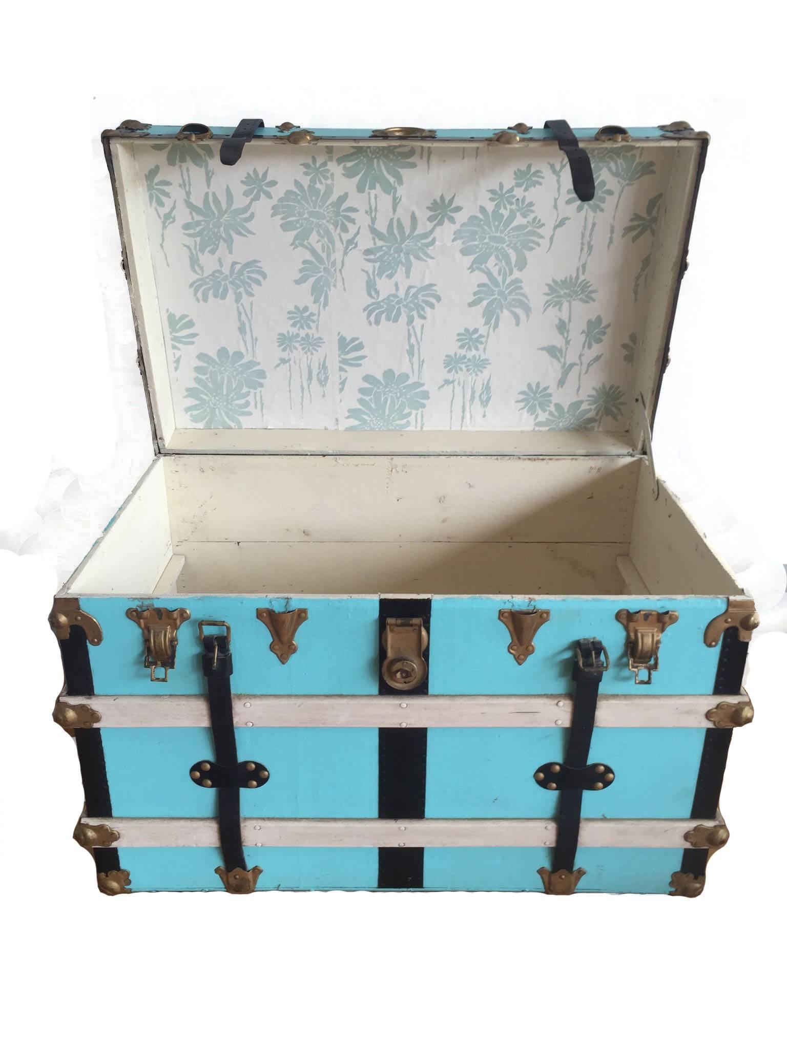 Vintage steamer trunk in leather, wood and metal.