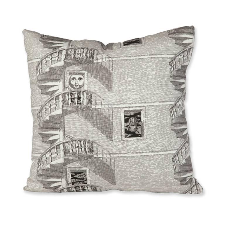 This pair of Piero Fornasetti Scala a Chiocciola Di Notte pillows reflects Fornasetti's essential style using transfer prints rendered in the style of engravings to decorate an endless variety of furnishings and housewares.
