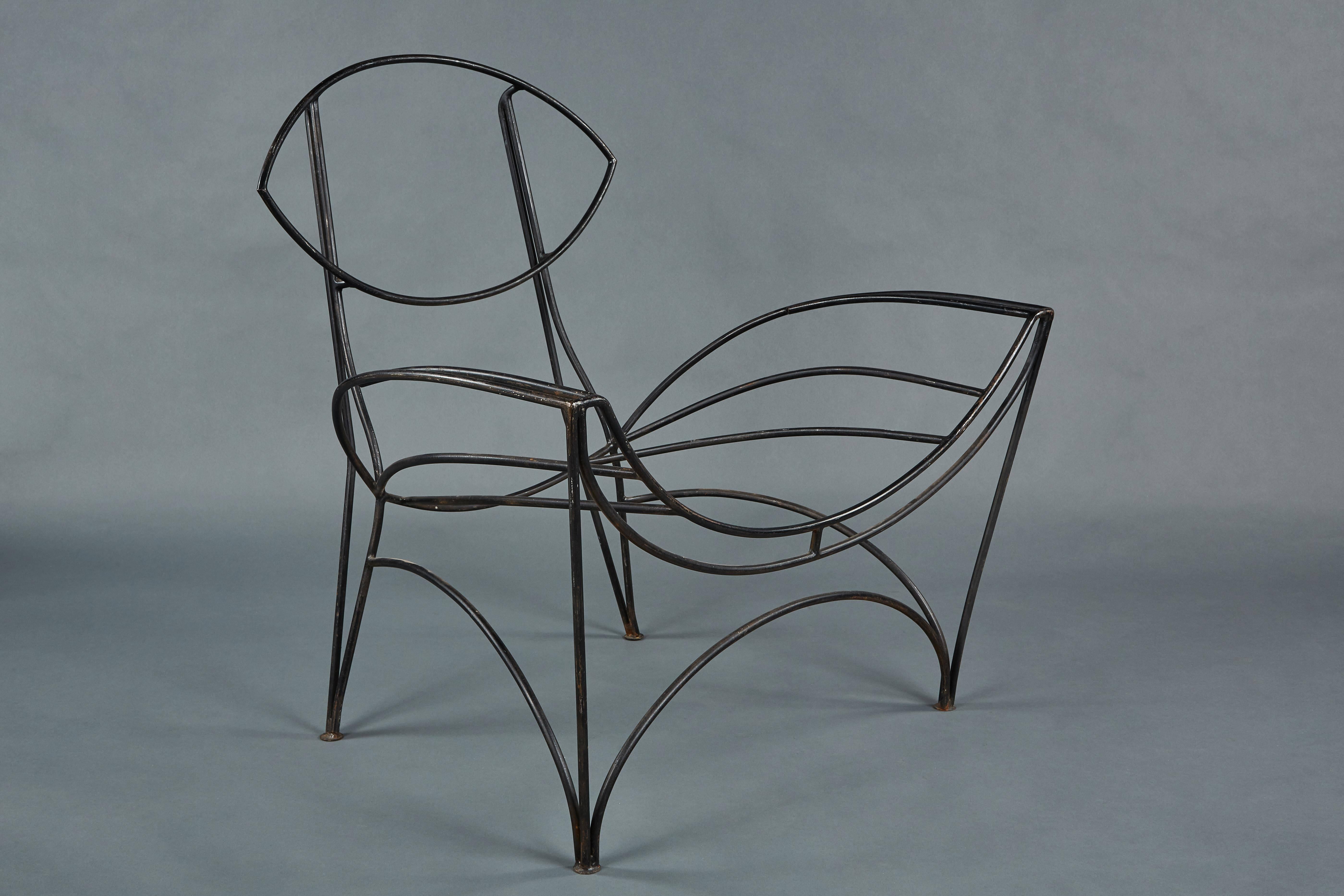 “Fat” iron chair by Tom Dixon. Frame stands alone as a very striking sculpture of painted iron.