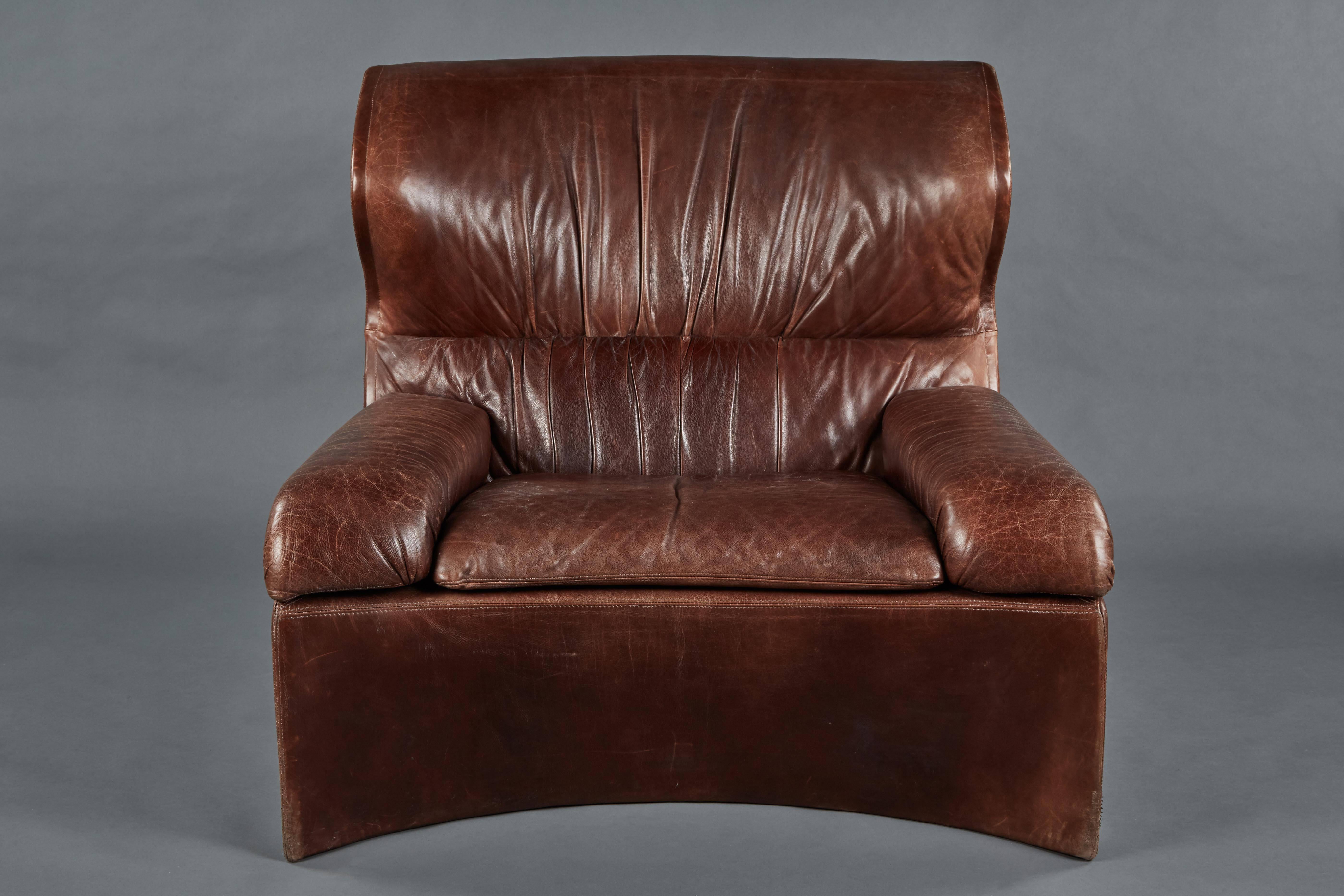 A Vela Alta chair by Giovanni Offredi for Saporiti. Leather is in a wonderful condition showing great patina.
