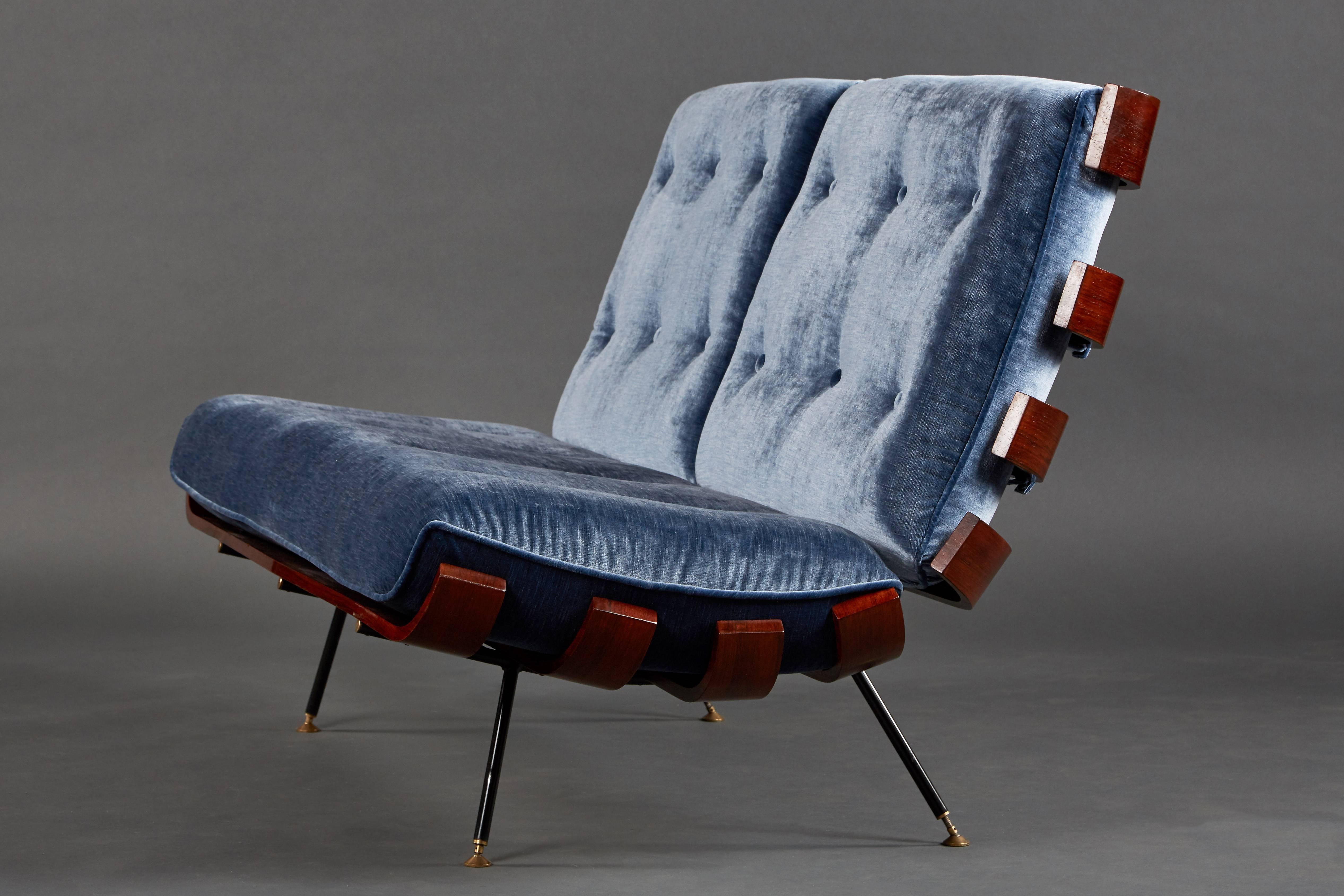 “Costela” (”Rib”) suite by Carlo Hauner and Martin Eisler. Made of Brazilian Sucupira wood with newly upholstered cushions in blue velvet. 

Dimensions in listing are for settee. 
Chairs measure: 32” H x 27.5” w x 32” D.