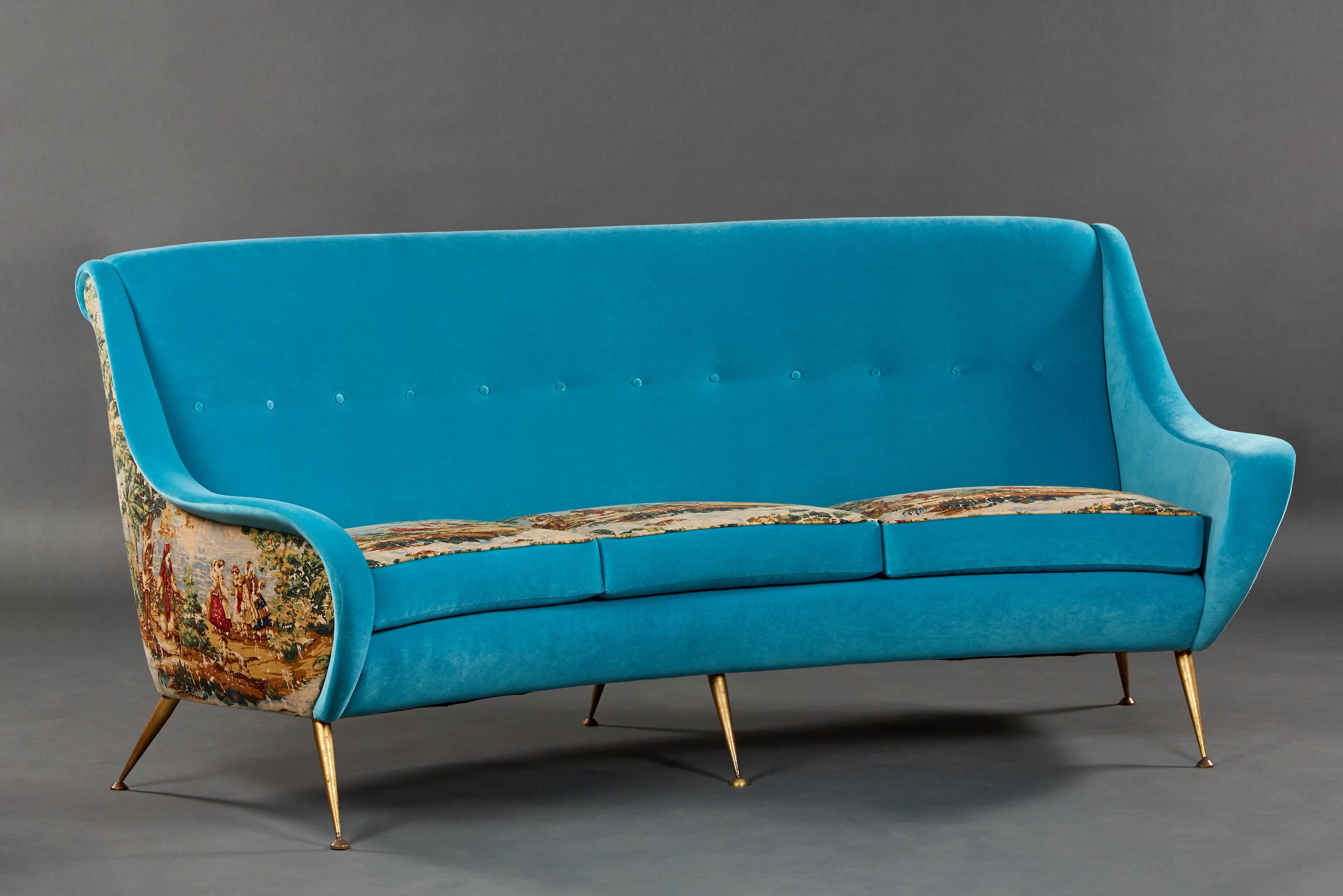 An elegant Italian suite of a sofa and two armchairs newly upholstered in turquoise velvet and toile. 

Sofa dimensions: 36” H x 75” W x 31” D
Chair dimensions: 35” H x 32” W x 31” D.