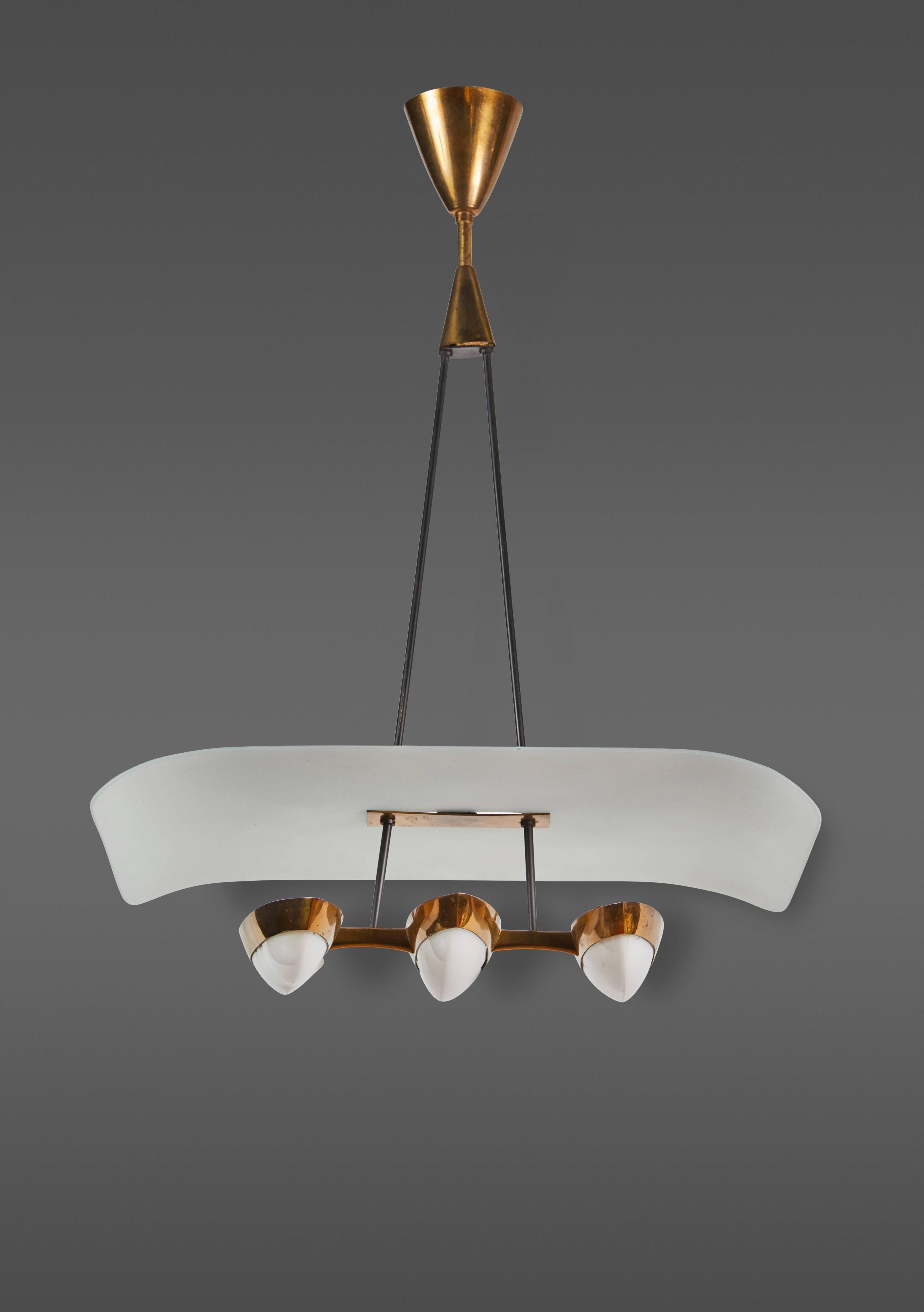 A petite Italian chandelier with three elegant oval lights, each accentuated by brass frames and an opaline glass diffuser.