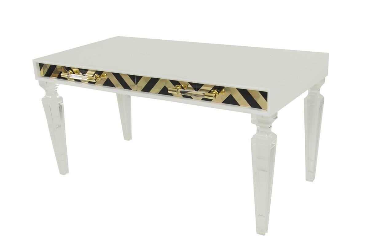 Modshop Capri desk has gone glam. Not only does the Capri collection represent the best of the current Chevron trend inset in the beautifully crafted door fronts, but this one features our Lucite and brass bar pulls and our Palm Beach Lucite legs.