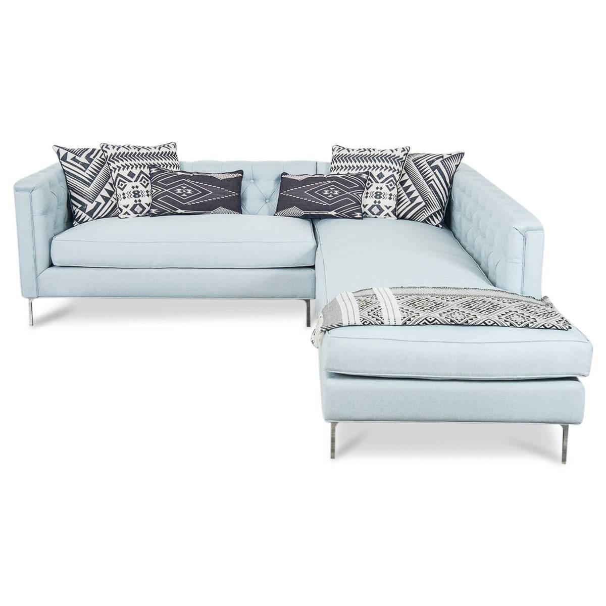 Finished in Ice blue linen and our chrome legs, this sectional has style and comfort all rolled into one.

Dimension:

8' x 8' chaise longue x 32