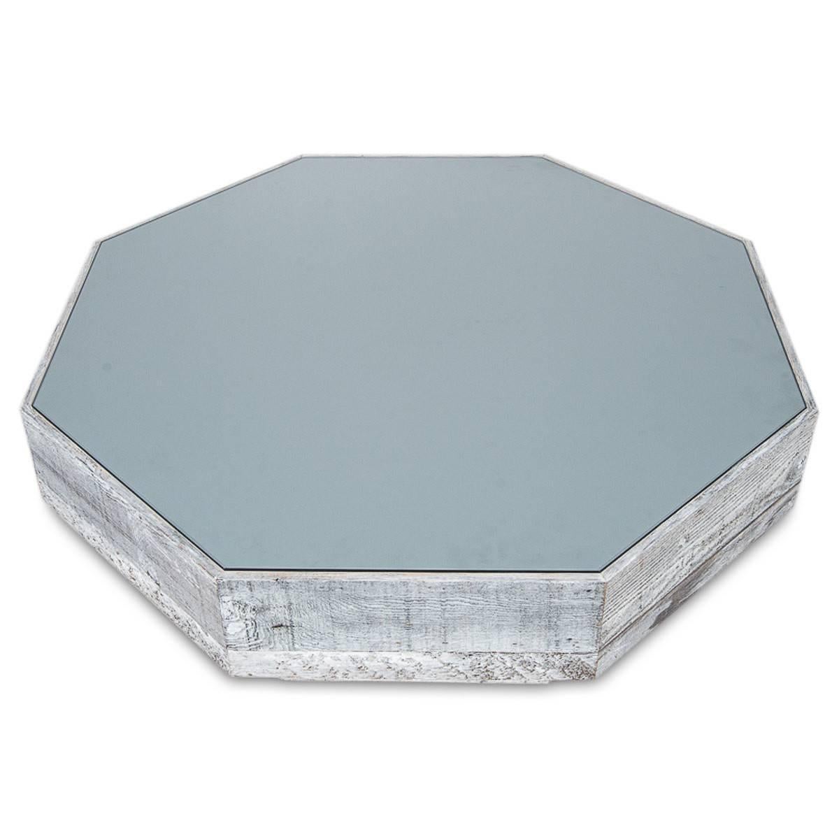 Recycled wood octagon coffee table has been updated with wood salvaged and repurposed. Shown here with grey glass, custom color options are available.

Dimensions:

44