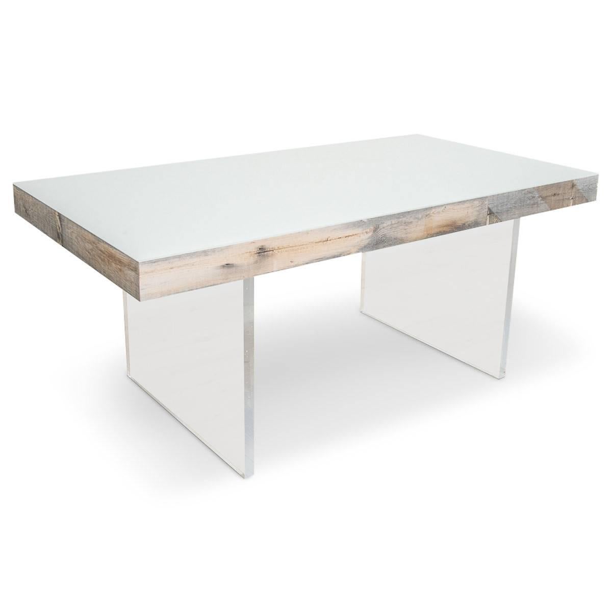 Our stylish new dining table is an Industrial modernist's dream. A beautiful glass top sits on recycled dark grey wood, standing on Lucite legs, creating the perfect mix of style and rugged functionality.

Dimensions:

96