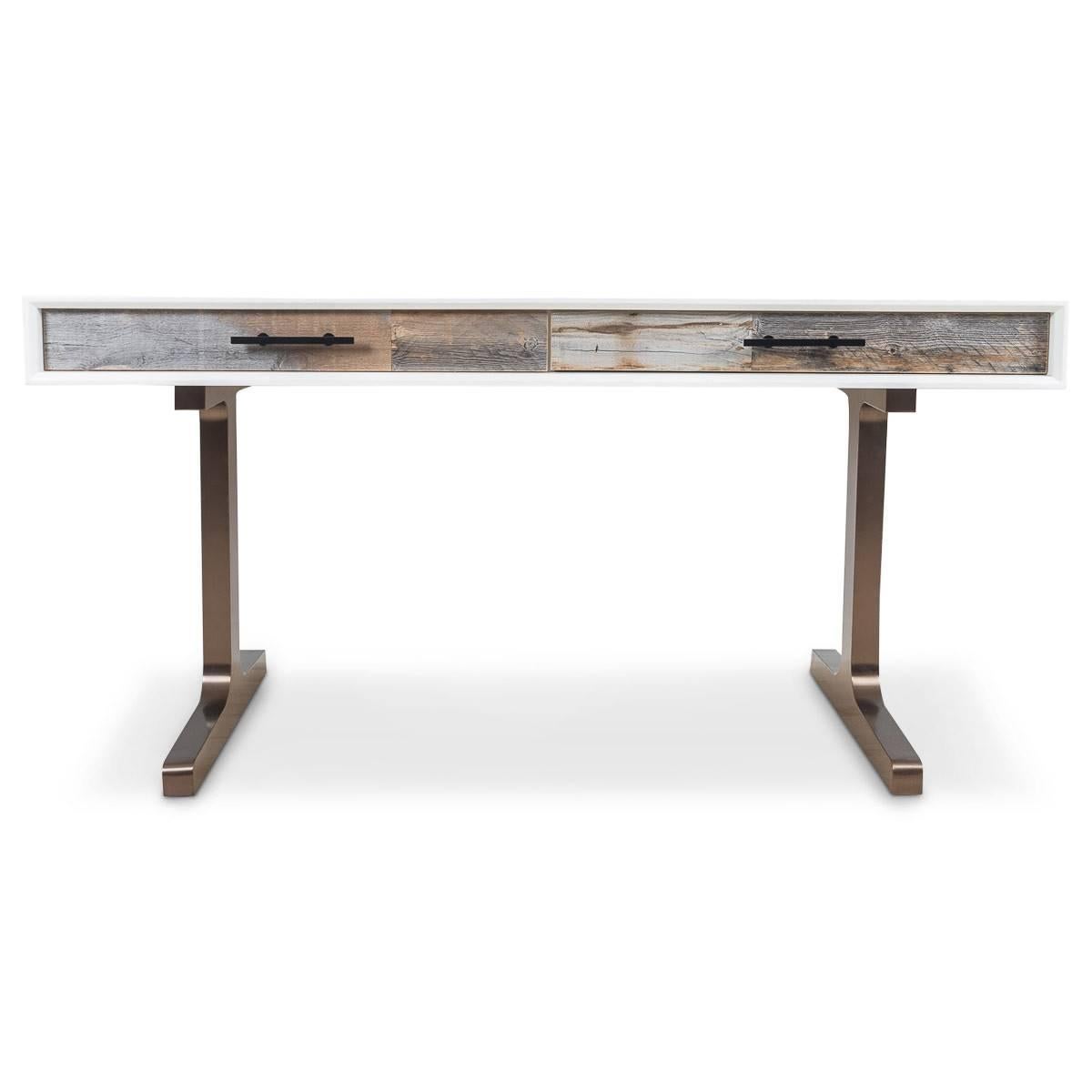 Our stylish new desk is an Industrial modernist's dream. A matte white box with beautiful grey recycled wood drawers and matte black metal bar pulls creates the perfect mix of style and rugged functionality. This desk sits on a solid T-shaped