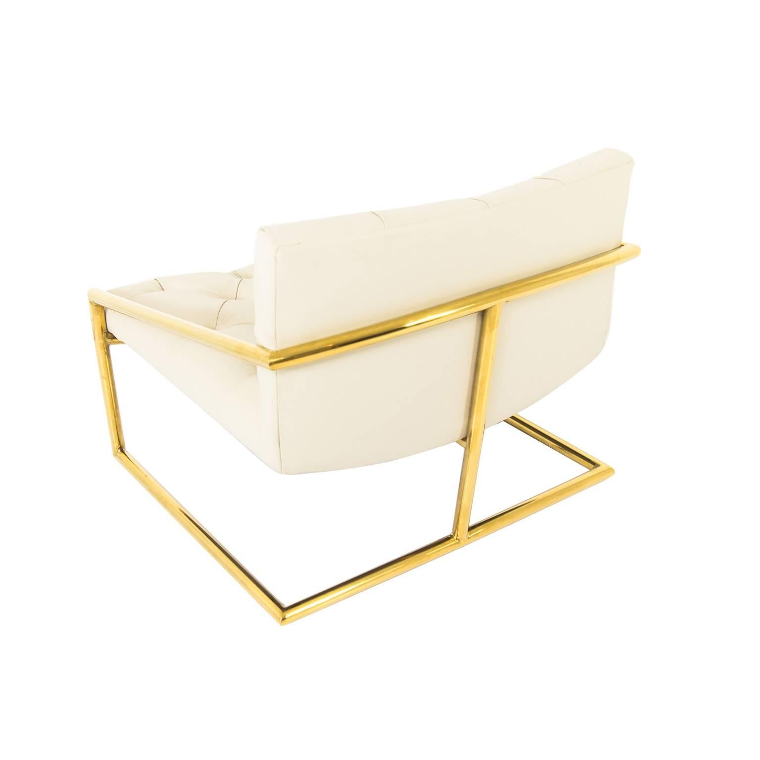 Modshop's Hampton chair is shown in hand-tufted Zenith milk leather with brass tubing for it's base.

Measures: 31
