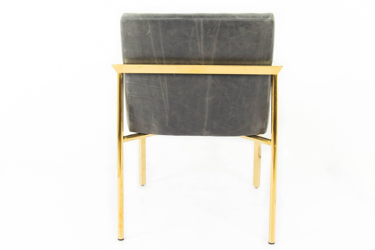 The Argentina chair with long arm tufting, distressed leather, brass frame with a slight pitched back. 
This is a made to order piece, if you are requesting additional chairs please contact us. 

Measures: 21.5