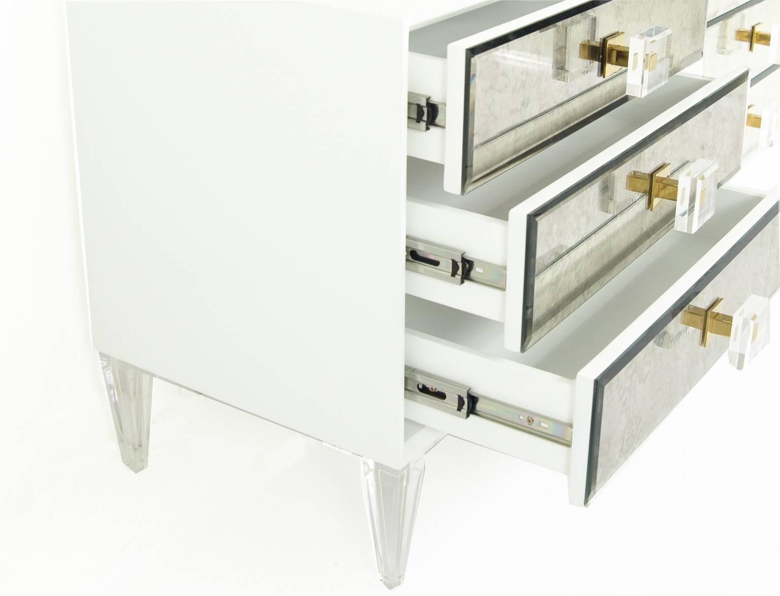 In a matte white box and gorgeous antique mirrors is ModShop's Juliette side table. Side table comes with three drawers that feature our Lucite and brass square pulls. This table is perfect to add a vintage look to any room.

This is a made to