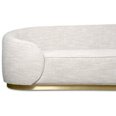 Curvy Wrap-Round Sofa with Brushed Brass Base and Textured Linen Upholstery