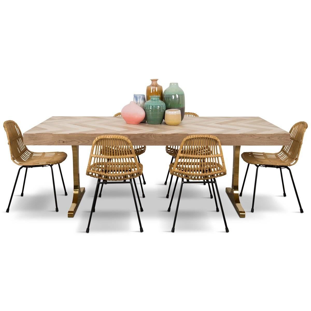 The Amalfi dining table is a wonderful addition to our Amalfi collection. The top is made of solid bleached walnut that is carefully laid out in a herringbone pattern. The table is supported with two elegant brass T-legs.

Dimensions:
84