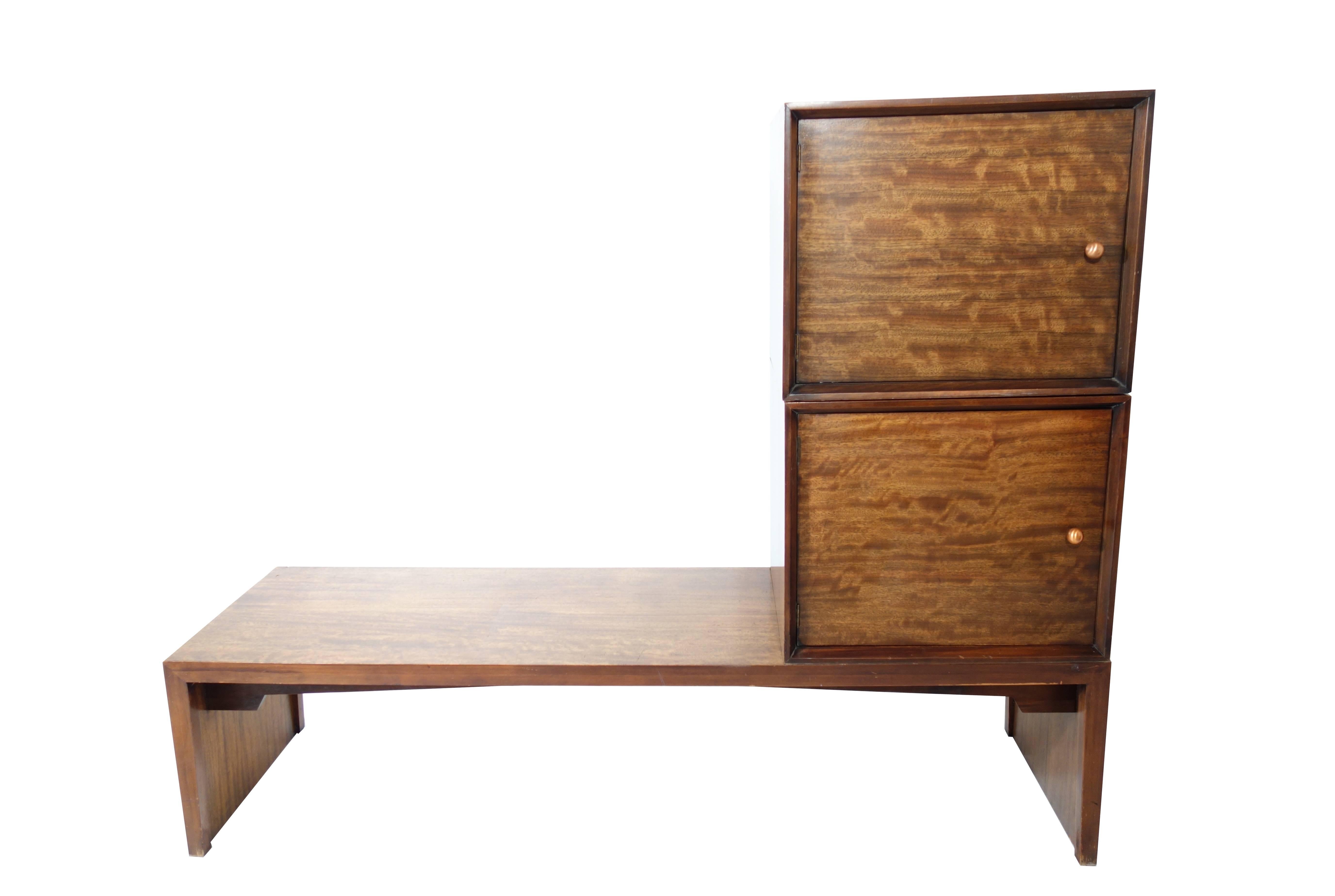 Bench and two storage cubes by Milo Baughman perspective line. The Cubes can be placed on the bench or floor. The Bench can also act as a coffee table. Striking two-toned mahogany in original condition. This line for Drexel was made exclusively for