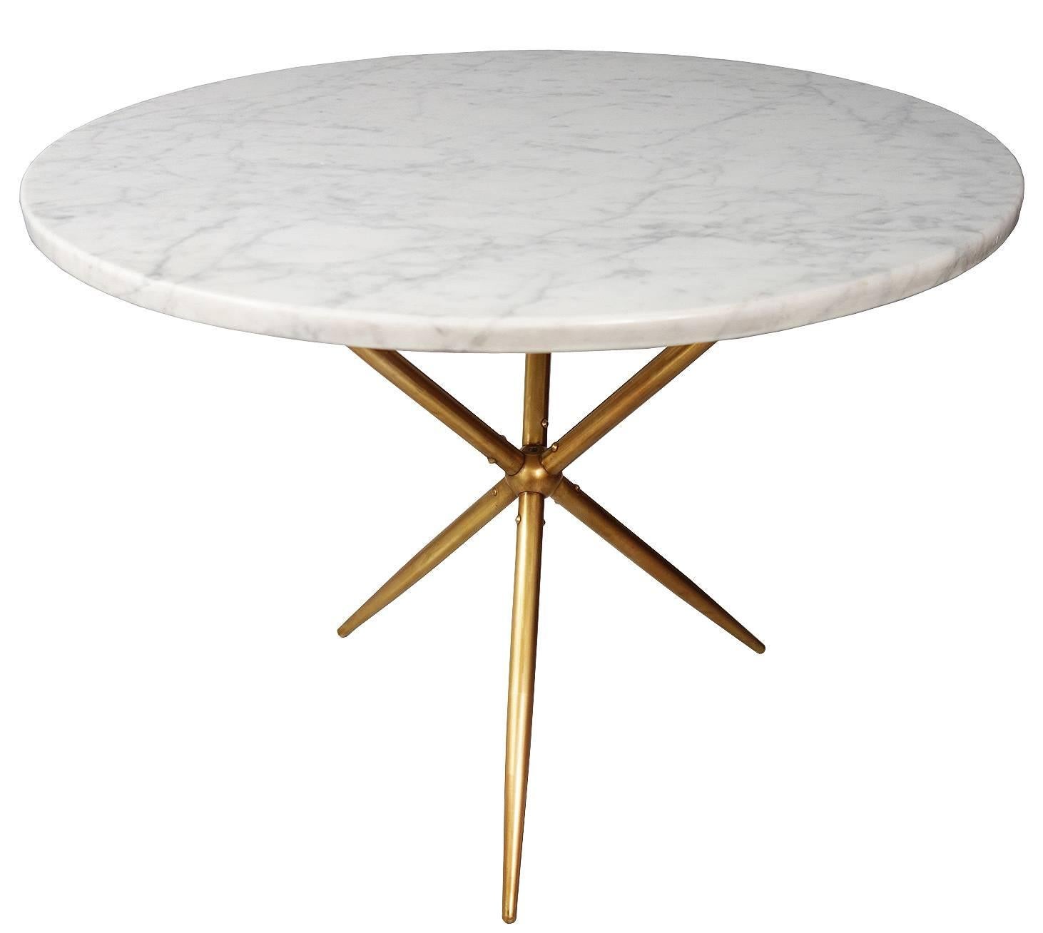 Attributed to Gio Ponti. Sputnik style marble side table on a solid brass base. Possibly gold-plated. Perfect size as a cafe, or side table.