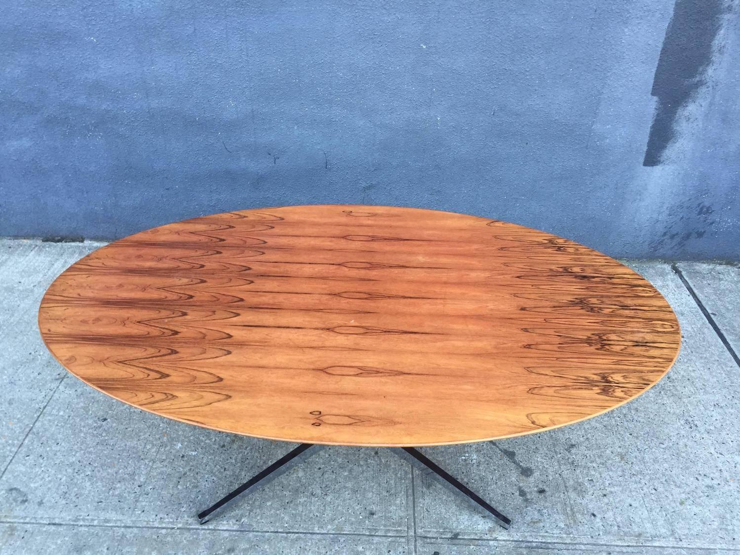 For your consideration is a 78'' Florence Knoll elliptical table / desk in stunning and assertive book matched Brazilian rosewood on a chrome-plated steel base. The piece was originally designed by Knoll as a desk, but can also be used as a table.