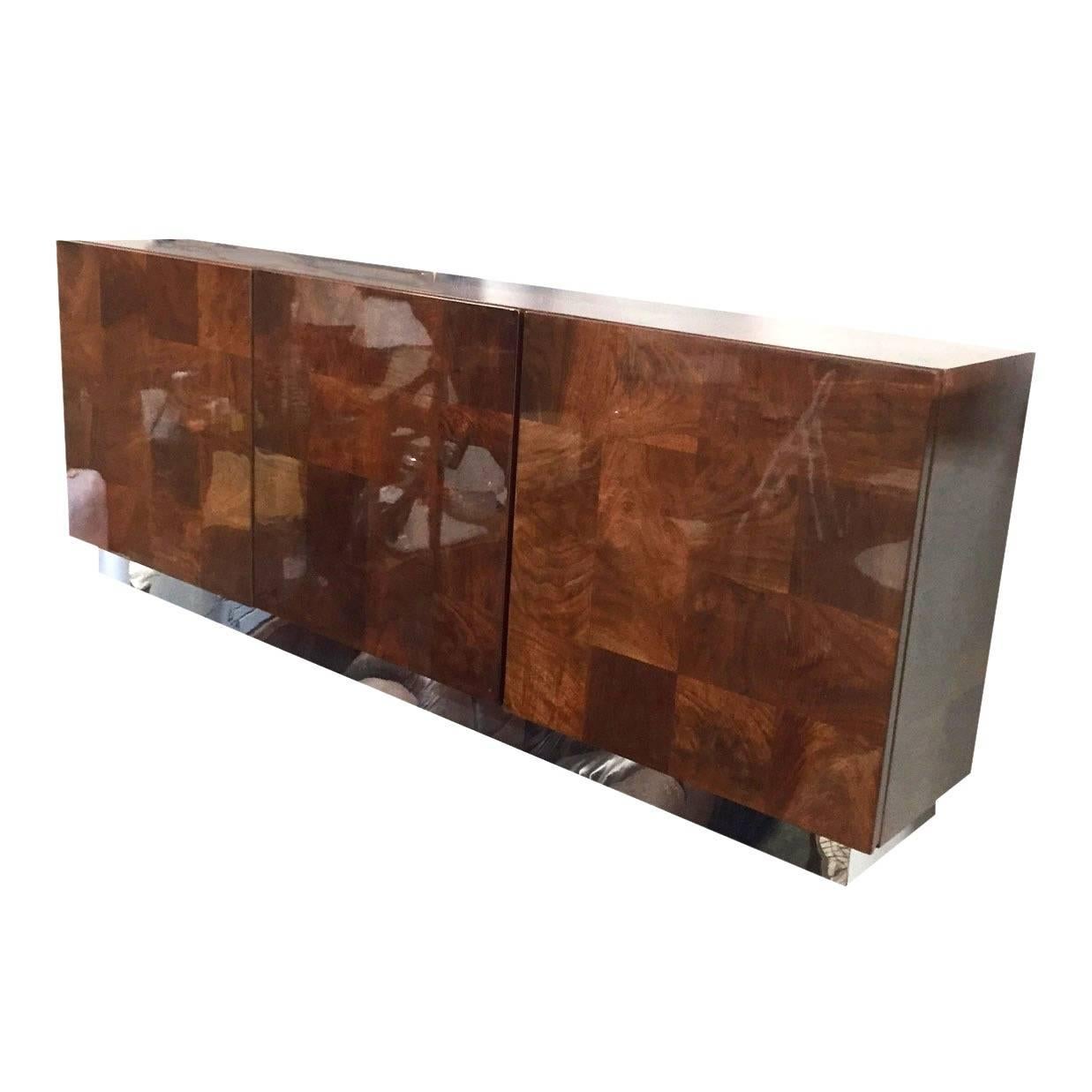 For sale is a beautiful Milo Baughman for Thayer Coggin patchwork credenza, very similar in look to work by Paul Evans.

The piece is in excellent condition, with very minor vintage wear as you can see in the photos.

Baughman was a leader in