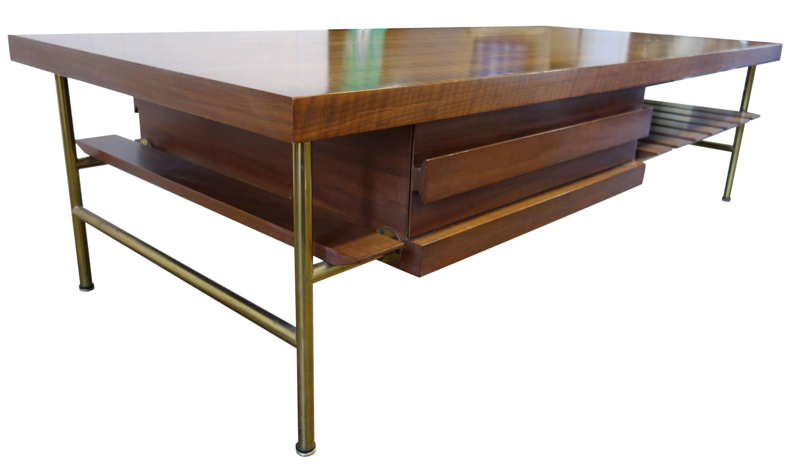 Rare coffee table (no. 2185) imported by M. Singer and Sons. Beautiful brass and Italian walnut details. 

One of the most influential Mid-Century Italian designers. Architect Ico Parisi also collaborated with his wife Luisa and his teacher Gio
