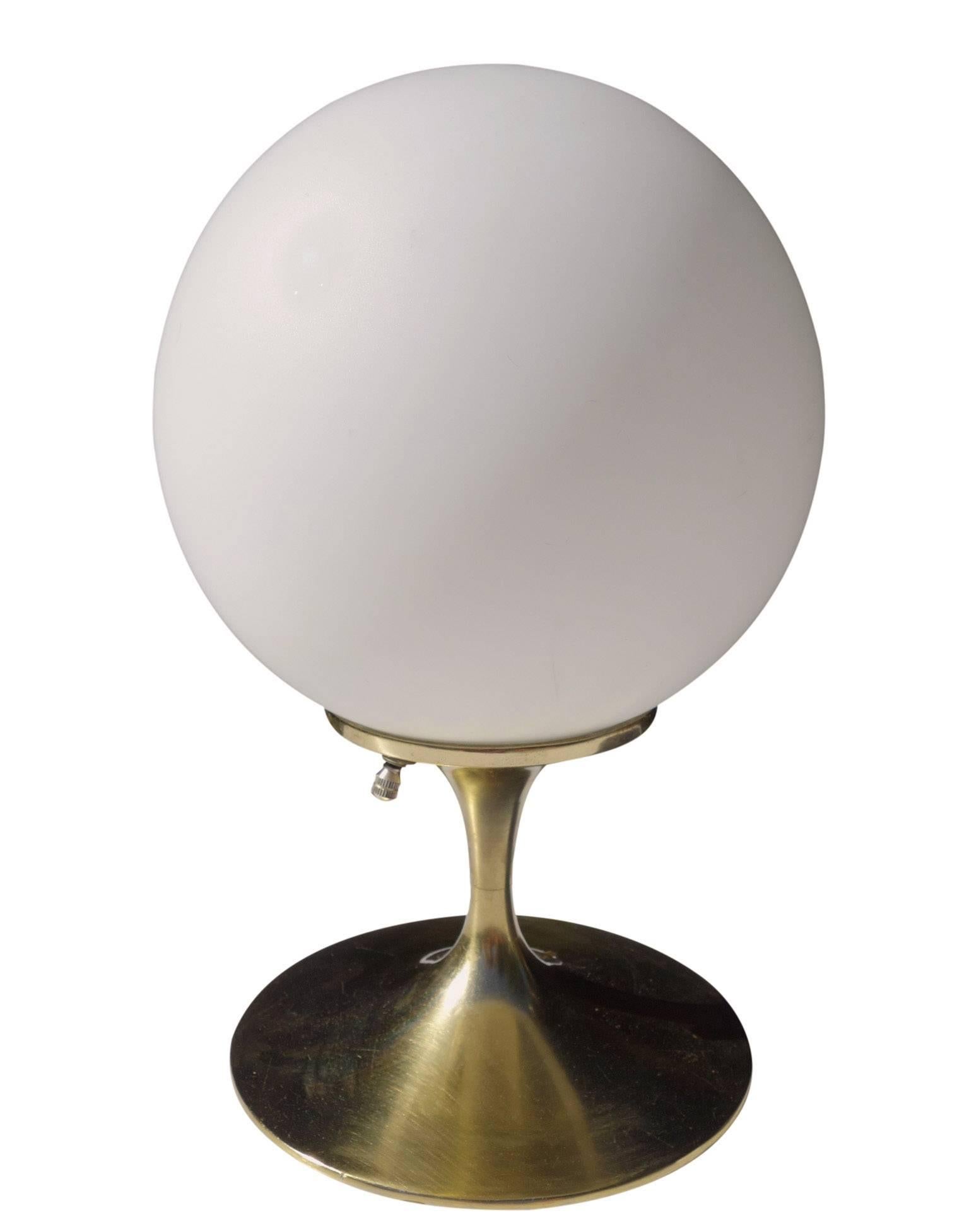 Wonderful Laurel lamp designed by Bill Curry. Featuring a white frosted glass globe on a brass tulip base.