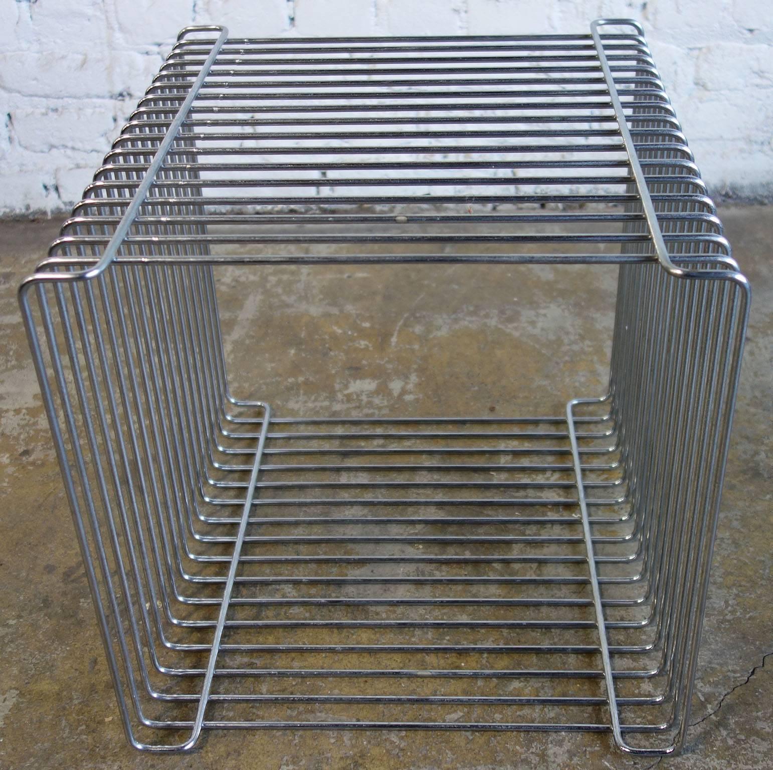 Rare Mid-Century Verner Panton Pantonova wire cube for Fritz Hansen.
They can be used as a stool or side table. Multiples can be stacked as a wall unit.