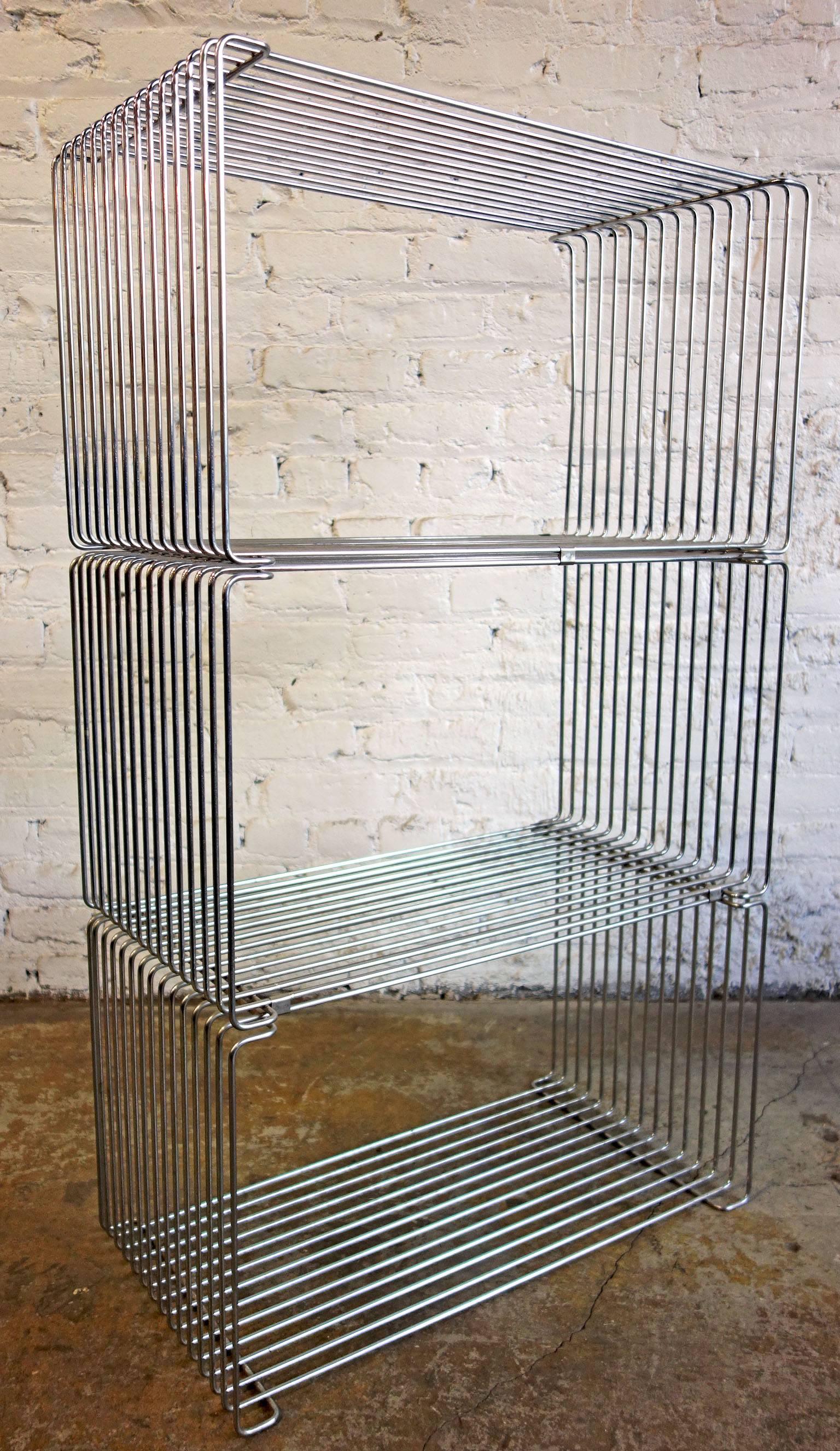 Rare Mid-Century Verner Panton Pantonova wire cube for Fritz Hansen.
They can be used as a stool or side table. Multiples can be configured into a wall unit.

Priced per cube section. One left