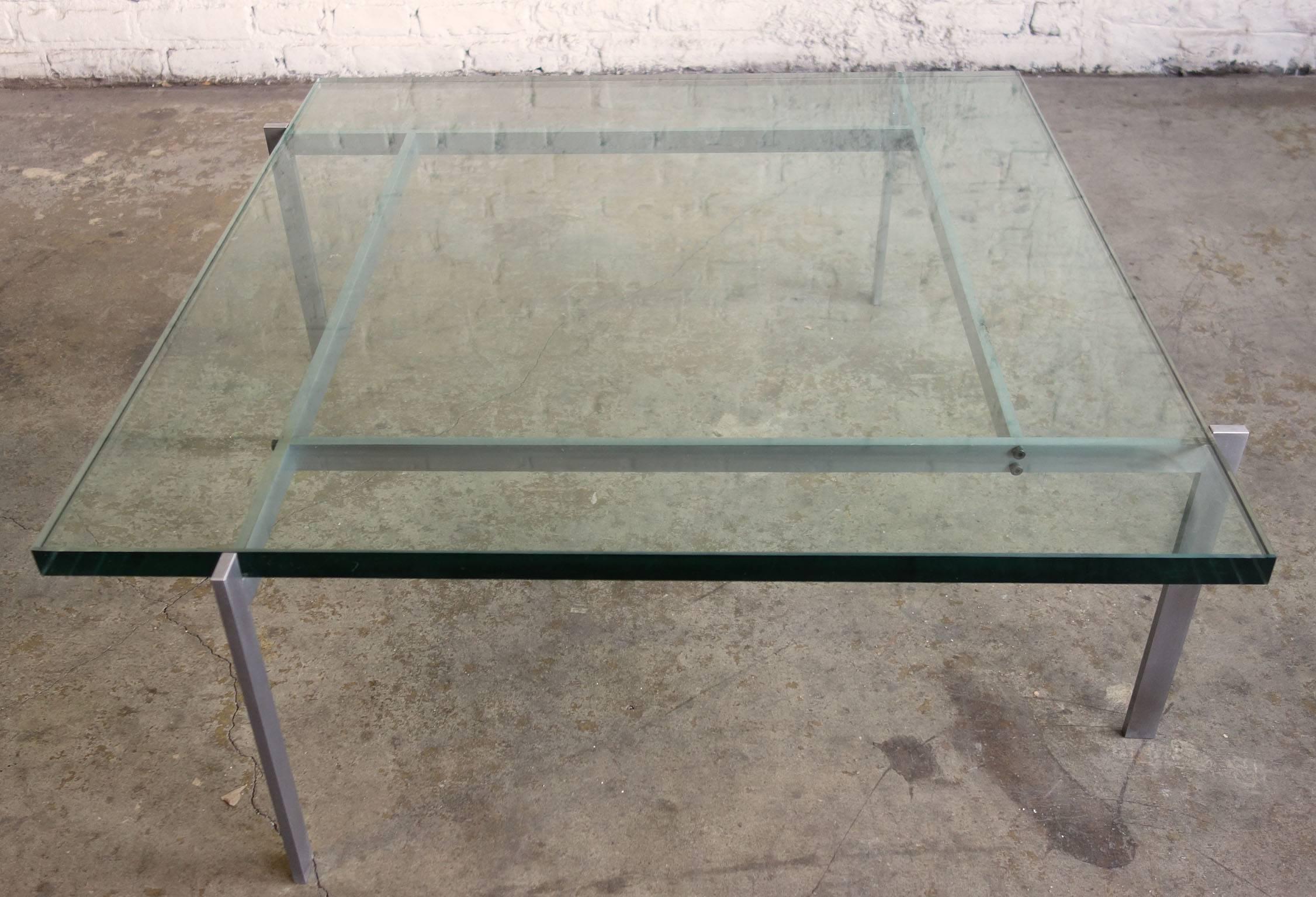 Mid-Century low table by Poul Kjaerholm, PK 61
Produced by E. Kold Christensen, Denmark. Stamped
original glass and frame showing little use.