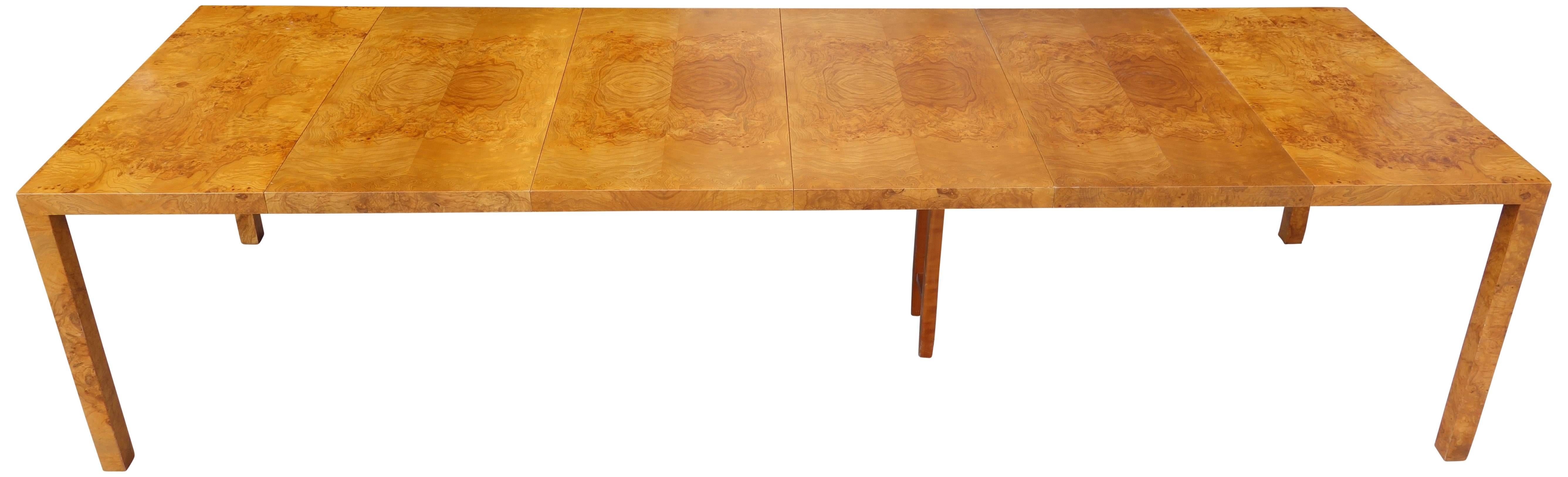 Exceptional highly figured burl wood Parsons style table by Milo Baughman for Directional.
Expands from 39'' to an astounding 123''.