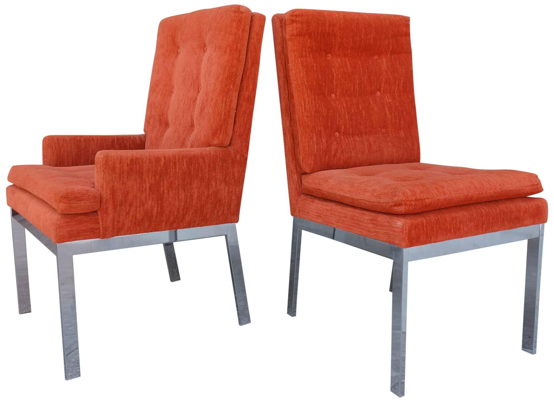 Mid-Century Milo Baughman dining chairs for DIA. Six chrome frame dining chairs with burnt orange tufted upholstery. Original upholstery in wonderful condition. DIA Labels on underside and factory care stickers still applied to frame. 

Armchairs
