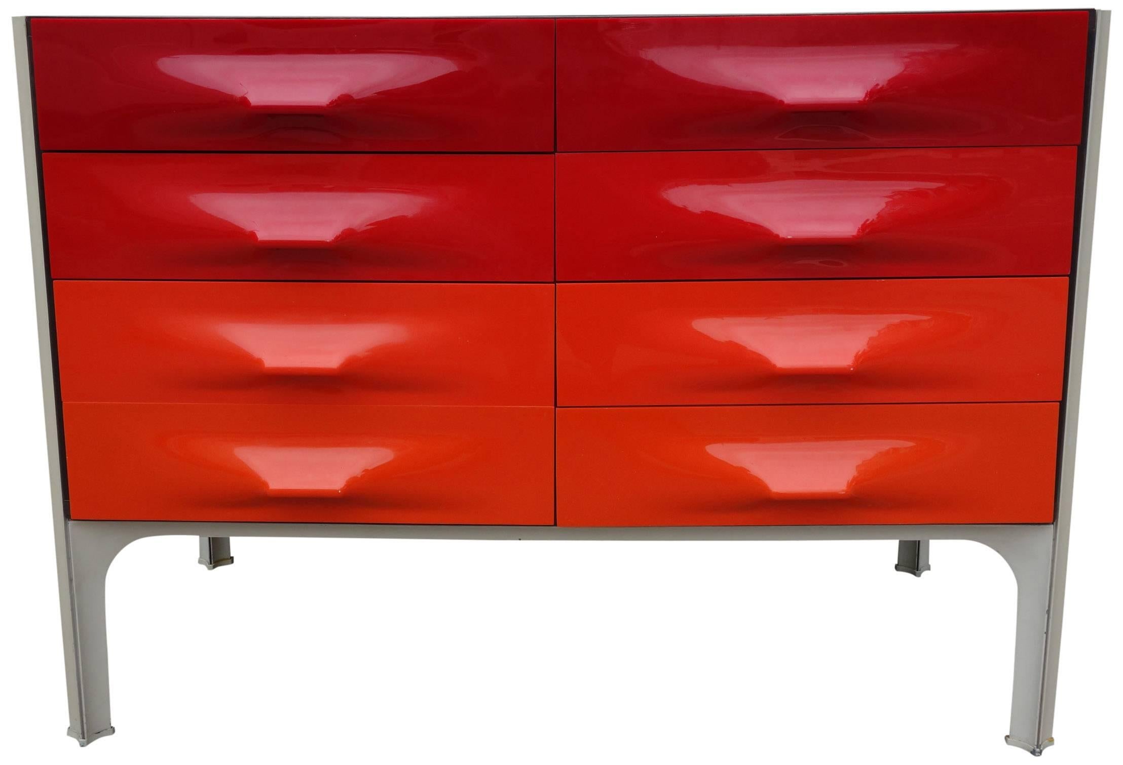Mid-Century Raymond Loewy DF-2000 dresser for Doubinsky Frères, France in 1969. Hard to find red front. All glides present and front panels showing minimal wear. Excellent example. Look for the double wide version that is also available.