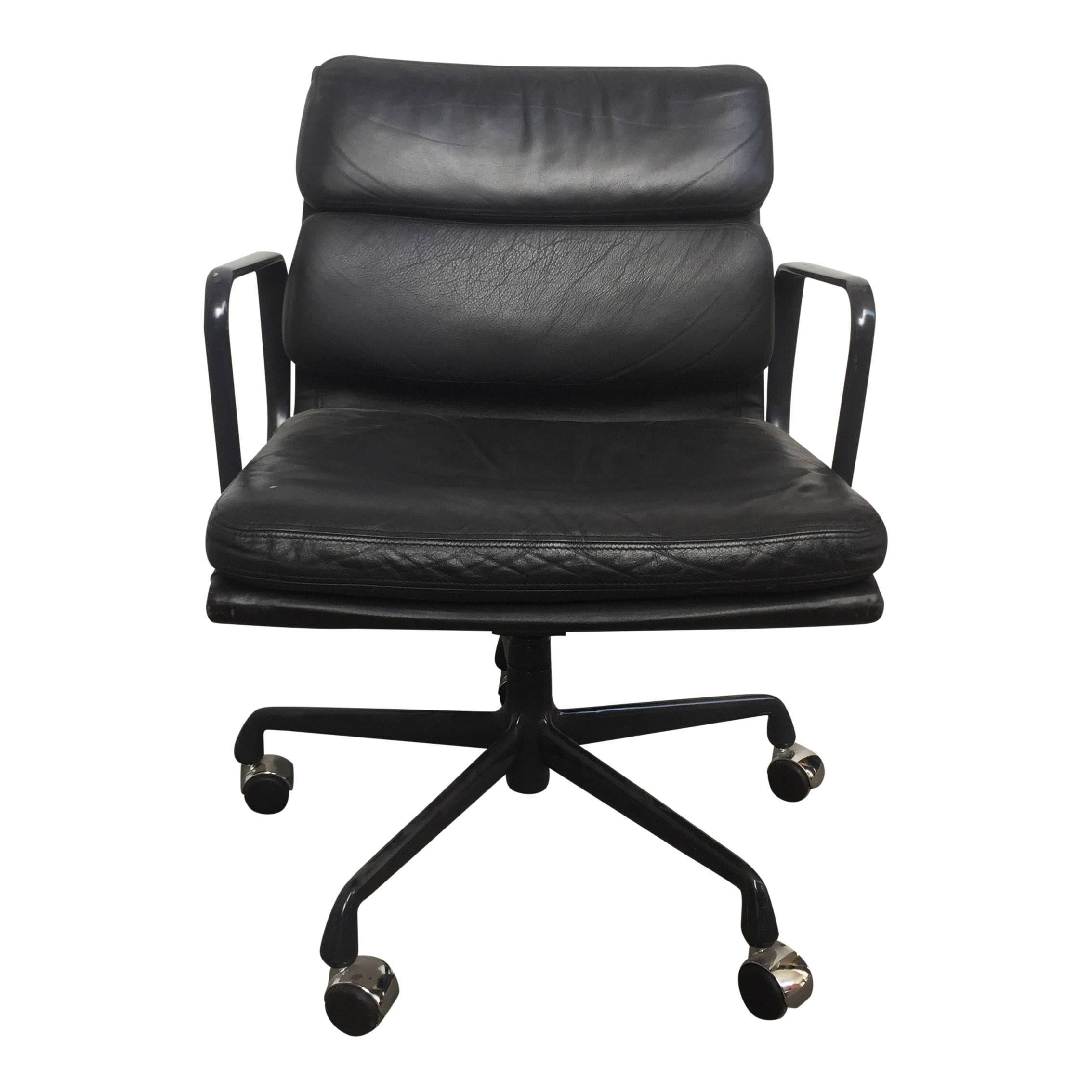 For your consideration at up to 17 authentic Eames for Herman Miller vintage soft pad chairs in black leather with low backs. 

These authentic vintage examples are icons of Mid-Century modern design. The chairs — part of the Eames Aluminum group