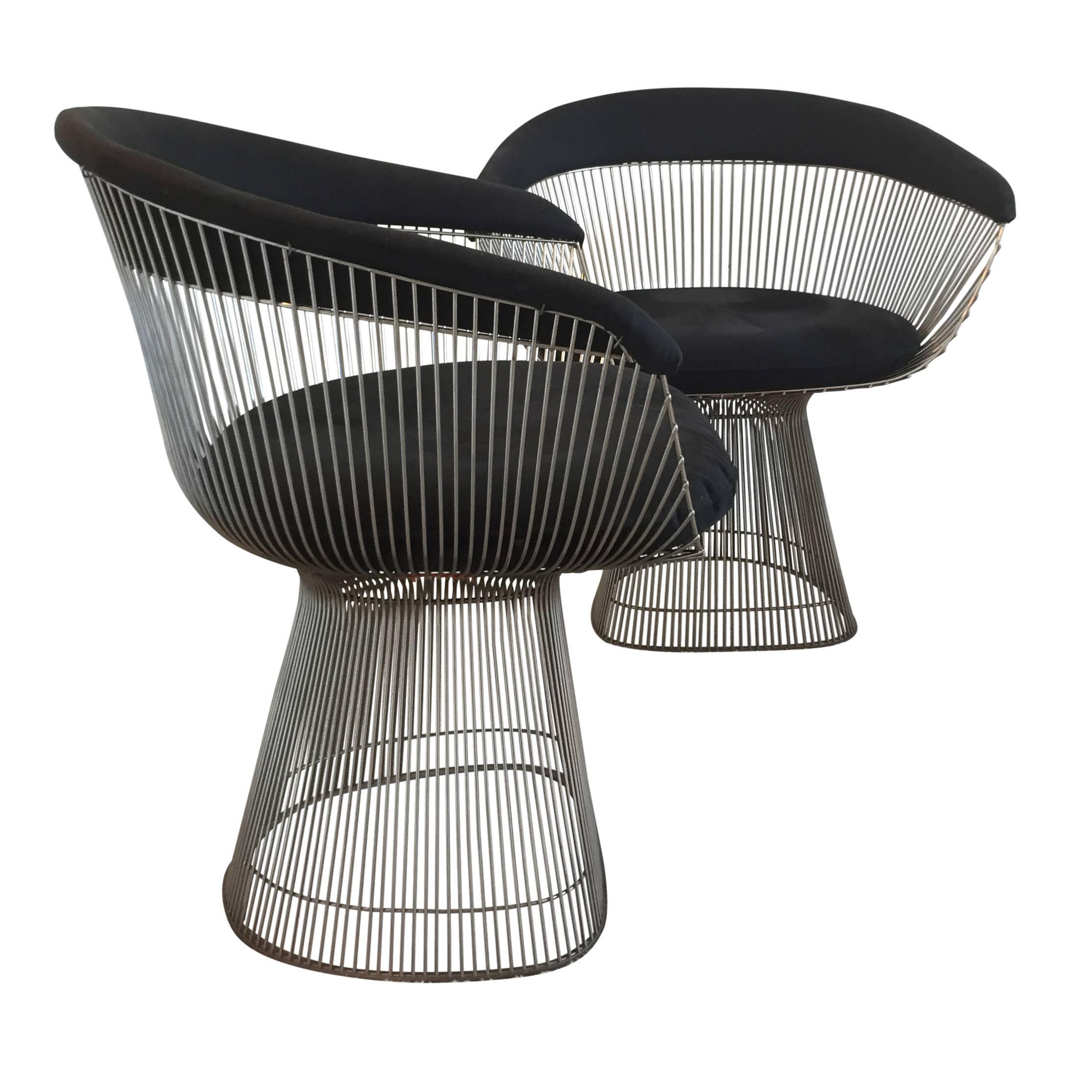 Up for sale are a a set of four Warren Platner for Knoll dining chairs with nickel frames and a black fabric.

These chairs are in great condition.

These chairs are icons of Mid-Century Modern design and are characteristic of Platner's playful