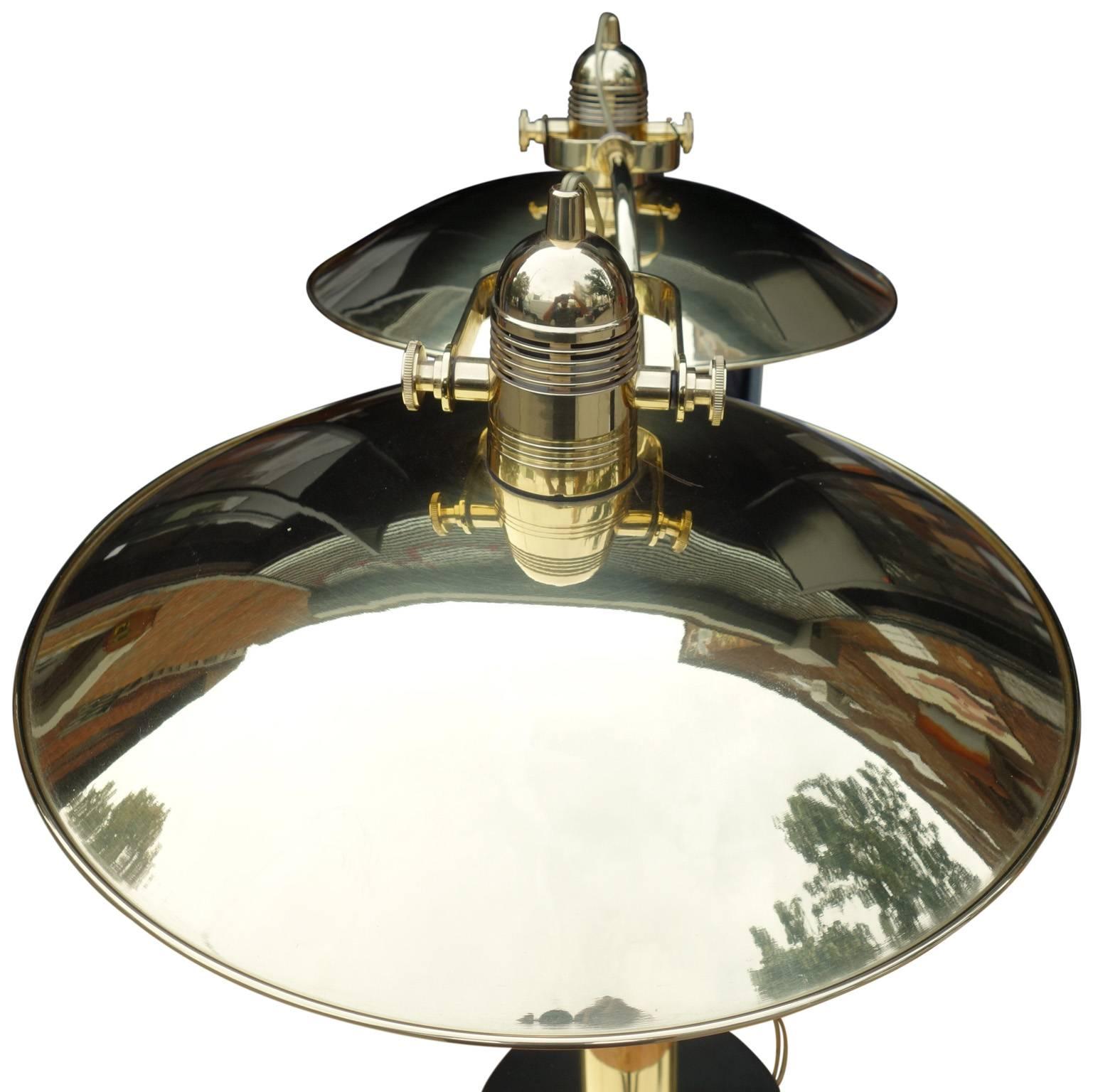 In wonderful condition. This polished brass Nessen lamp is quite striking a displays beautifully. Originally curated by Warren Platner for a home he deigned in Greenwich, CT. 

Another pair of Agusti Nessen lamps are also available. 

Base