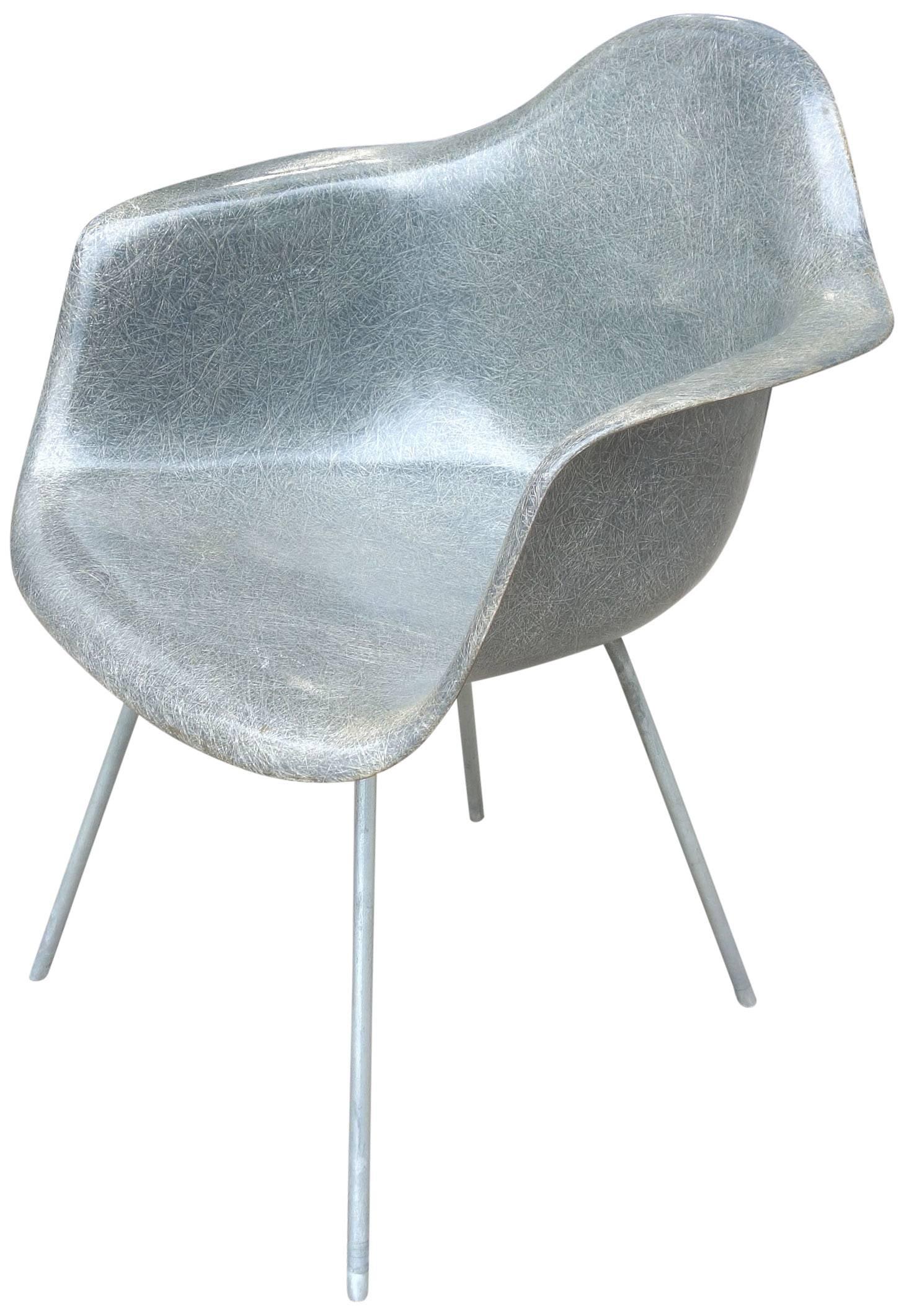 Midcentury Eames for Herman Miller fiberglass armchair elephant hide grey rope edge. Features an even beautiful grain with a lighter almost seafoam color in the light. retains original Zenith label. A must for any midcentury collector.