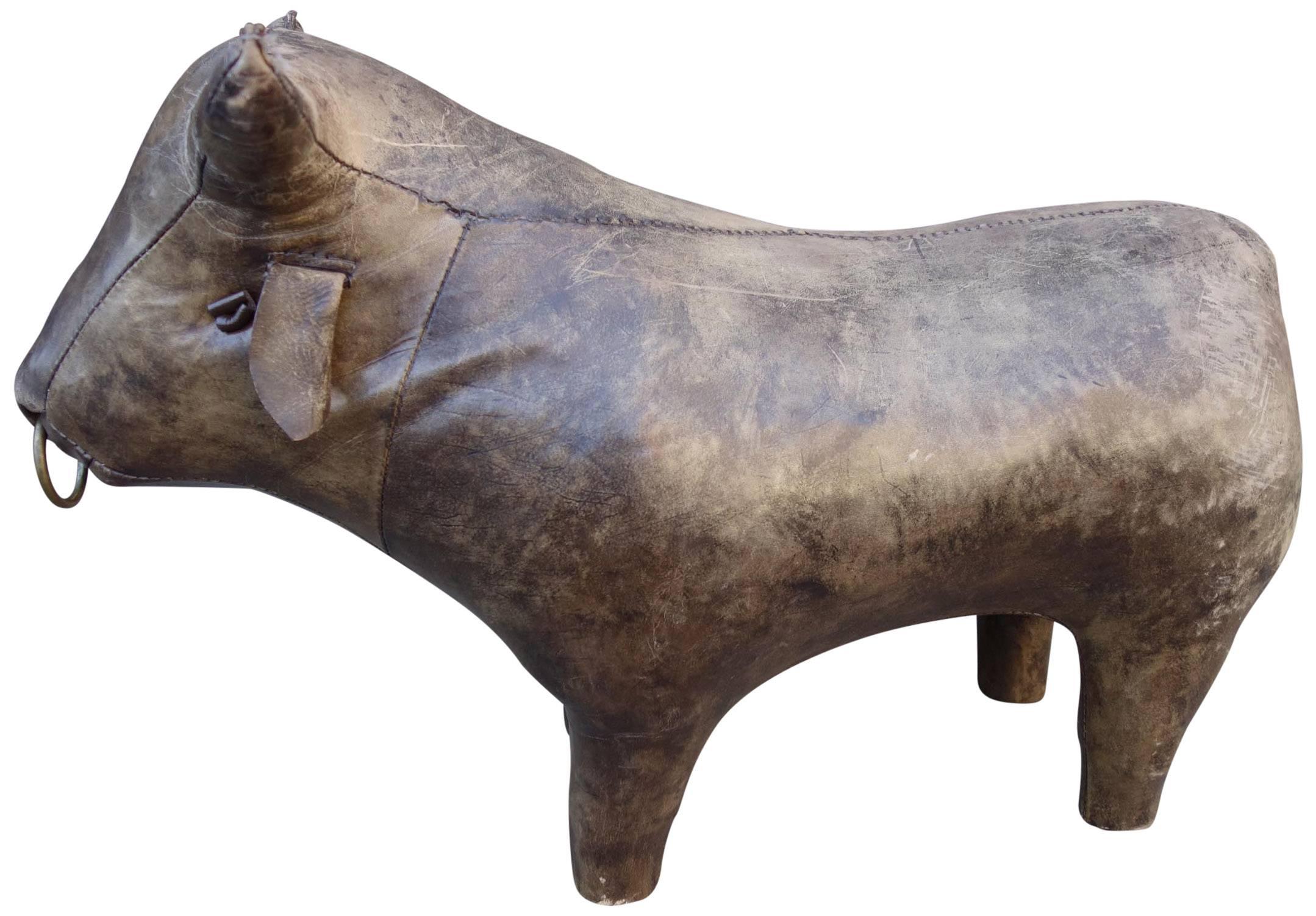 Vintage Dimitri Omersa for Abercrombie & Fitch leather bull footstool or ottoman. Wonderful decorative item to have in a room. Lost his tail otherwise in excellent vintage condition.