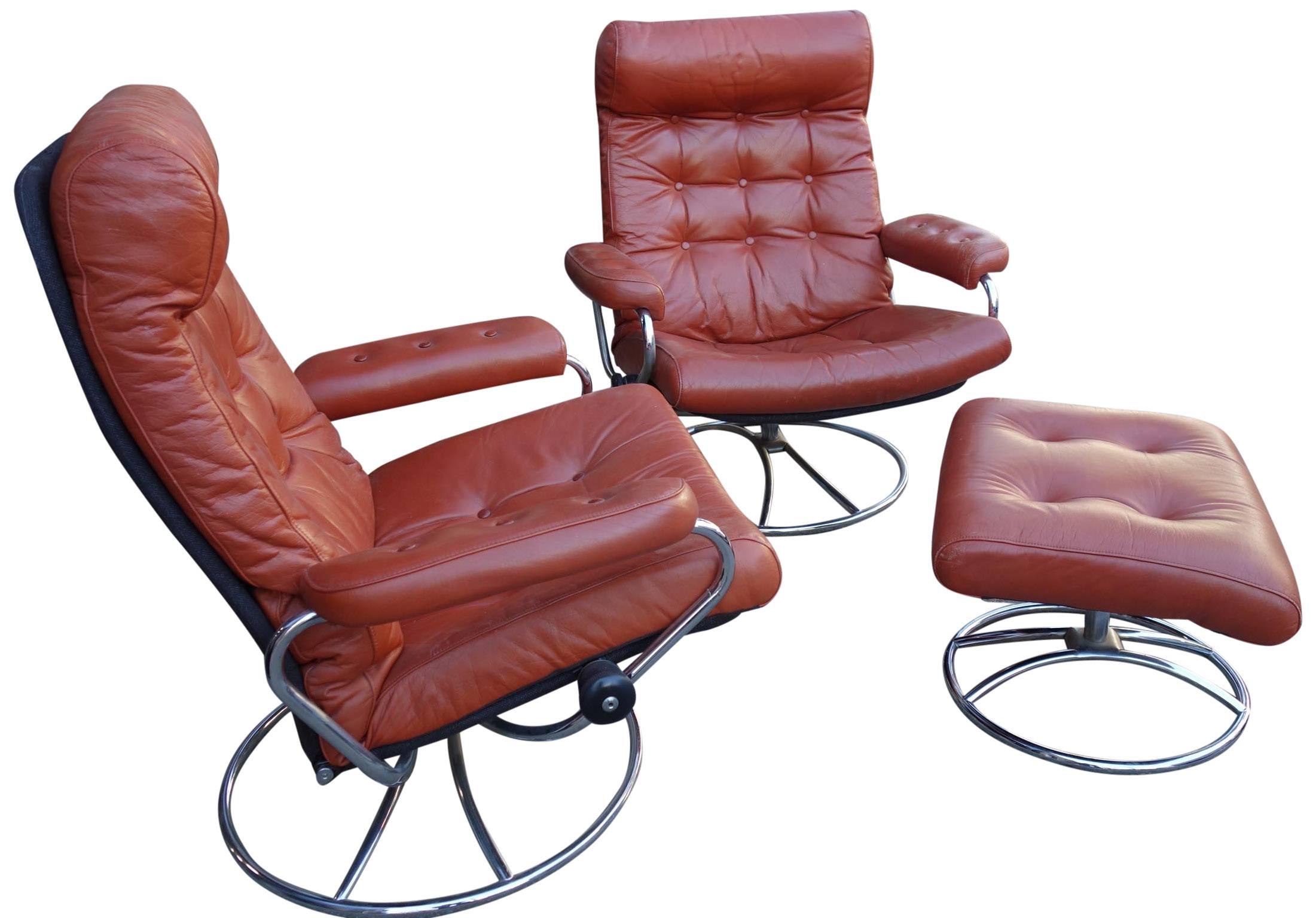 What a great set of vintage lounge chairs. Incredibly comfortable. This set includes two chairs and one ottoman.