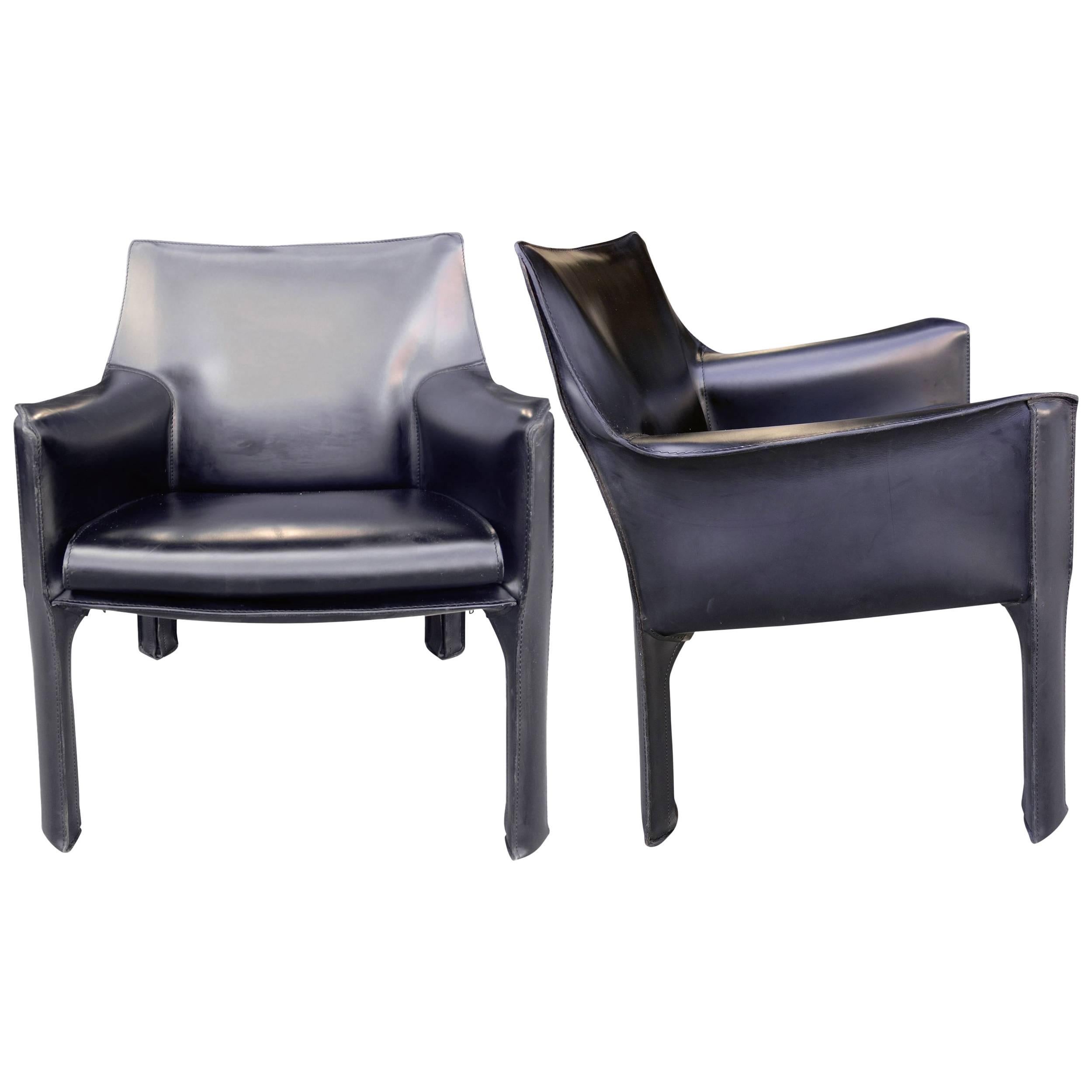 Listing is for one midcentury Mario Bellini Cab 414 chair in black saddle leather. Showing very little wear most likely never used. Dimensions are suited as a club, easy, or lounge chair. Incredibly comfortable. 

Measures: Seat height 16.5
