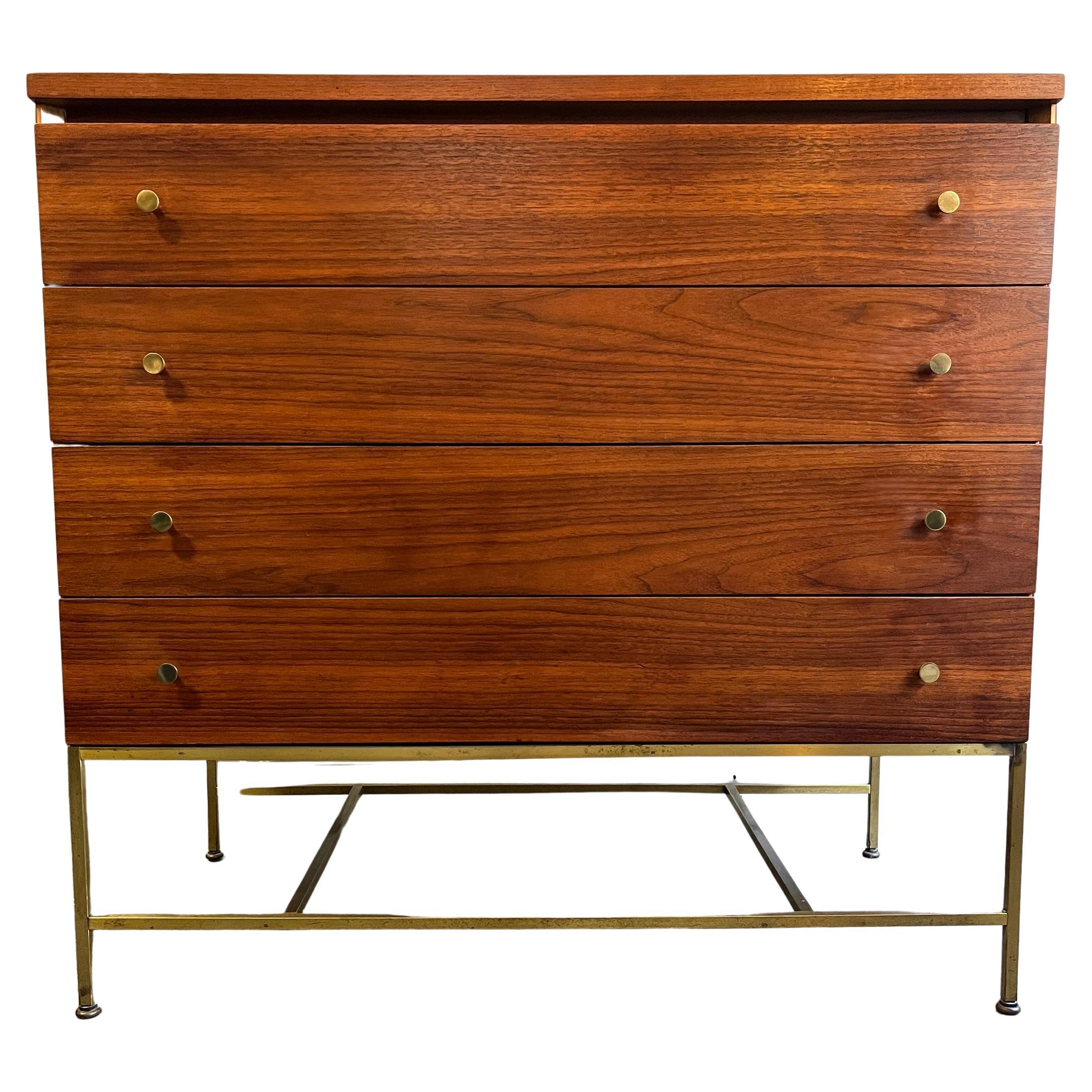 Beautiful Paul McCobb rare 4 drawer dresser Irwin Collection by Calvin- Irwin Collection. Walnut case piece on a brass base. In wonderful original condition showing nice grain patterns and very little, honest use. No chips or loss to wood. 

Each