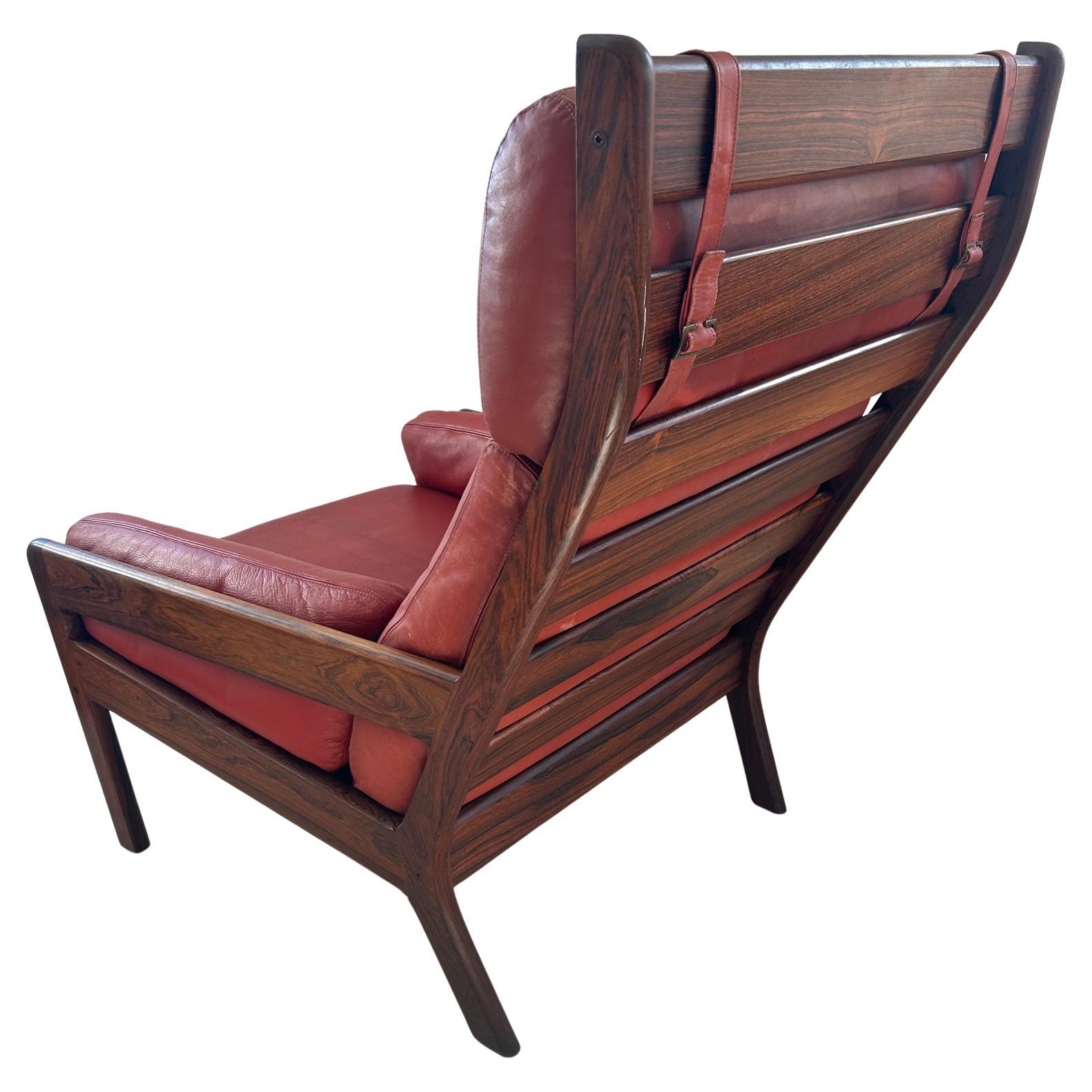 Midcentury Scandinavian Modern Solid Rosewood Red Leather Lounge Chair For Sale