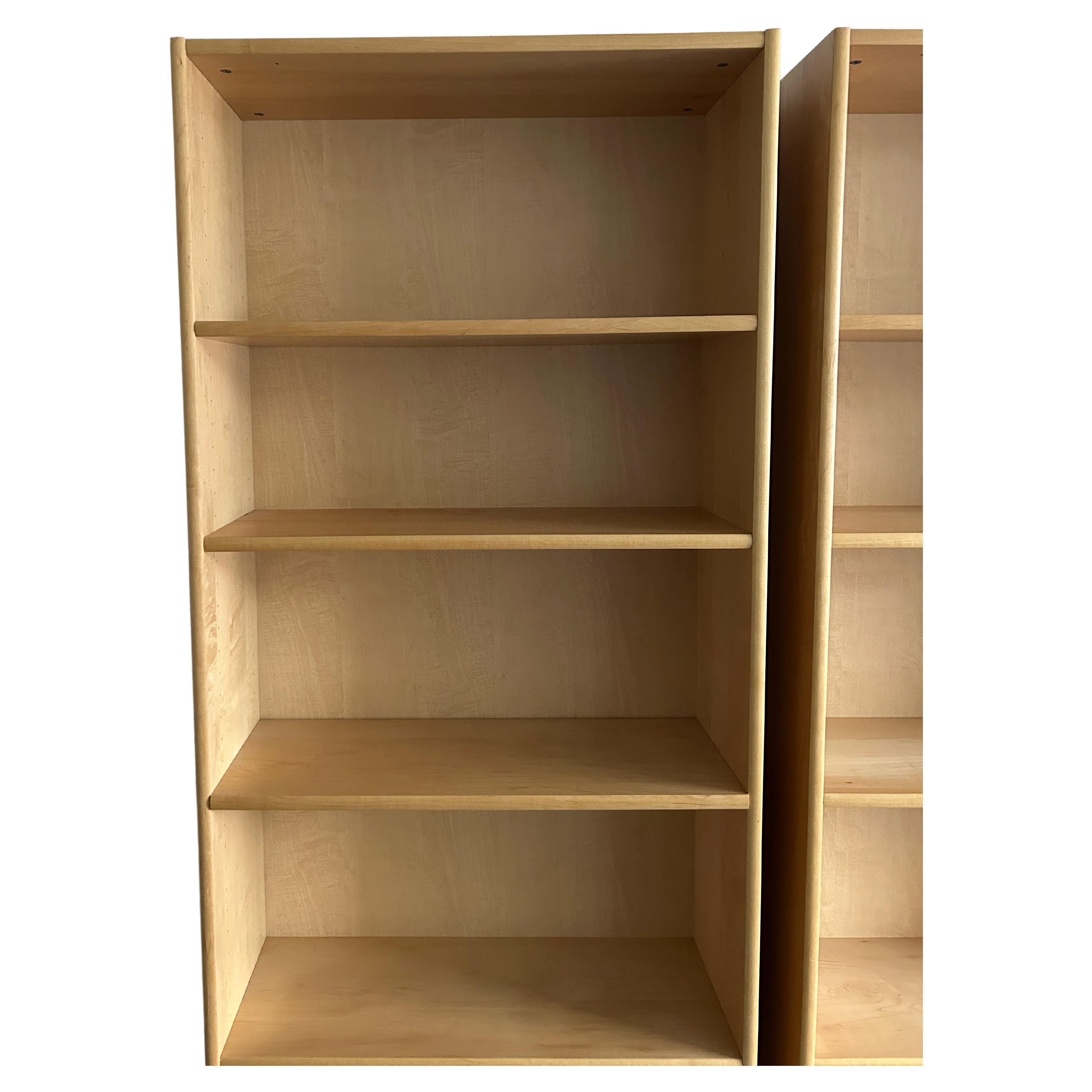 Pair of Mid century Scandinavian Modern blonde birch wood shelf wall unit or open bookcases. Very modern design and well built. Made of birch veneer plywood shelves and structural. Very solid bookcases 3 shelves adjust in each unit. Made in Denmark.