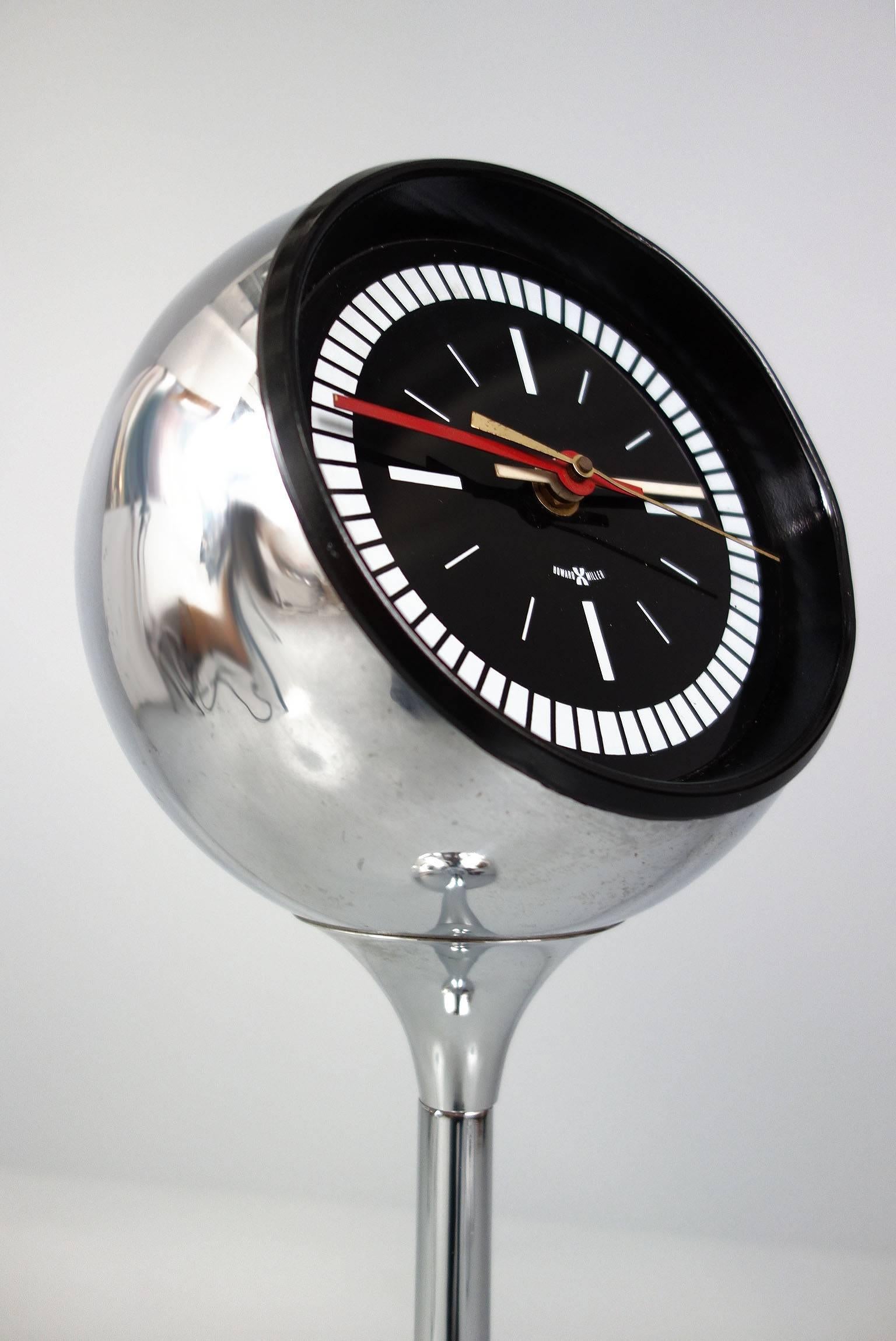 Rare George Nelson floor clock for Howard Miller. Chrome ball face on a tulip base. A truly stunning clock seldom seen.