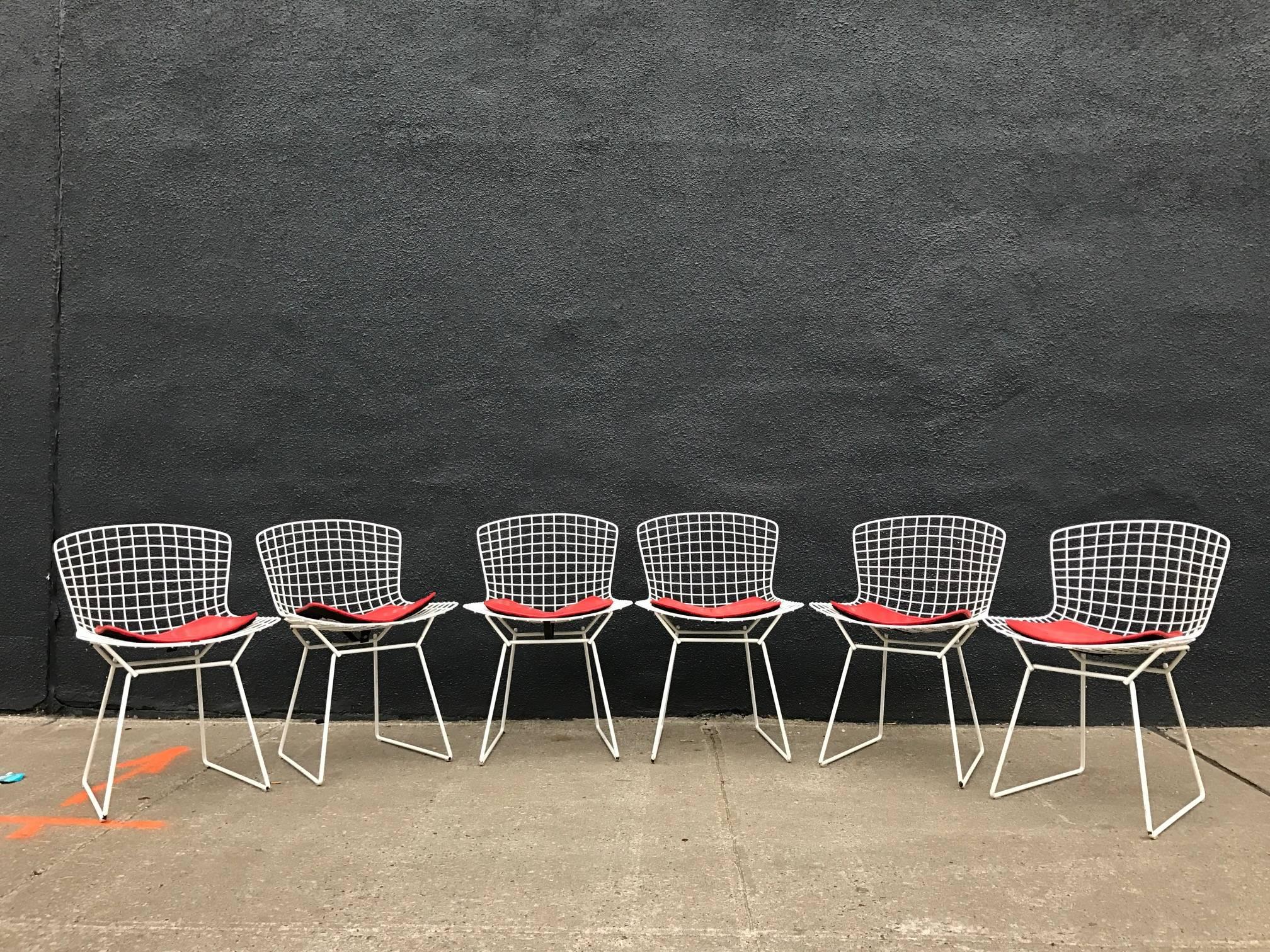 For your consideration are Harry Bertoia for Knoll vintage side chairs. These authentic examples are icons of Mid-Century modern design, and are still being produced to this day. Their timeless form makes these versatile chairs they can be used as