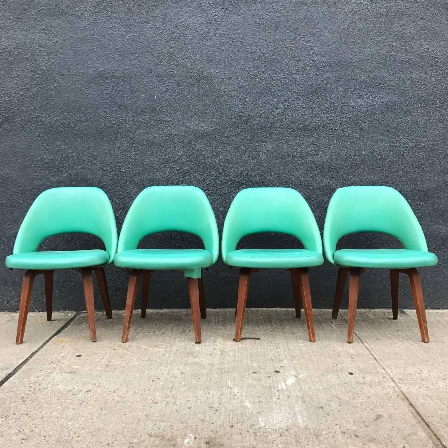 For sale is an awesome set of Eero Saarinen for Knoll executive side chairs on wooden walnut legs.

These are authentic vintage examples. These original production examples from the 1960s are difficult to find. Though these chairs are still