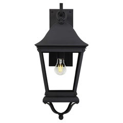 Modern Spanish Colonial Style Wrought Iron Exterior Lantern with bell-curved lid