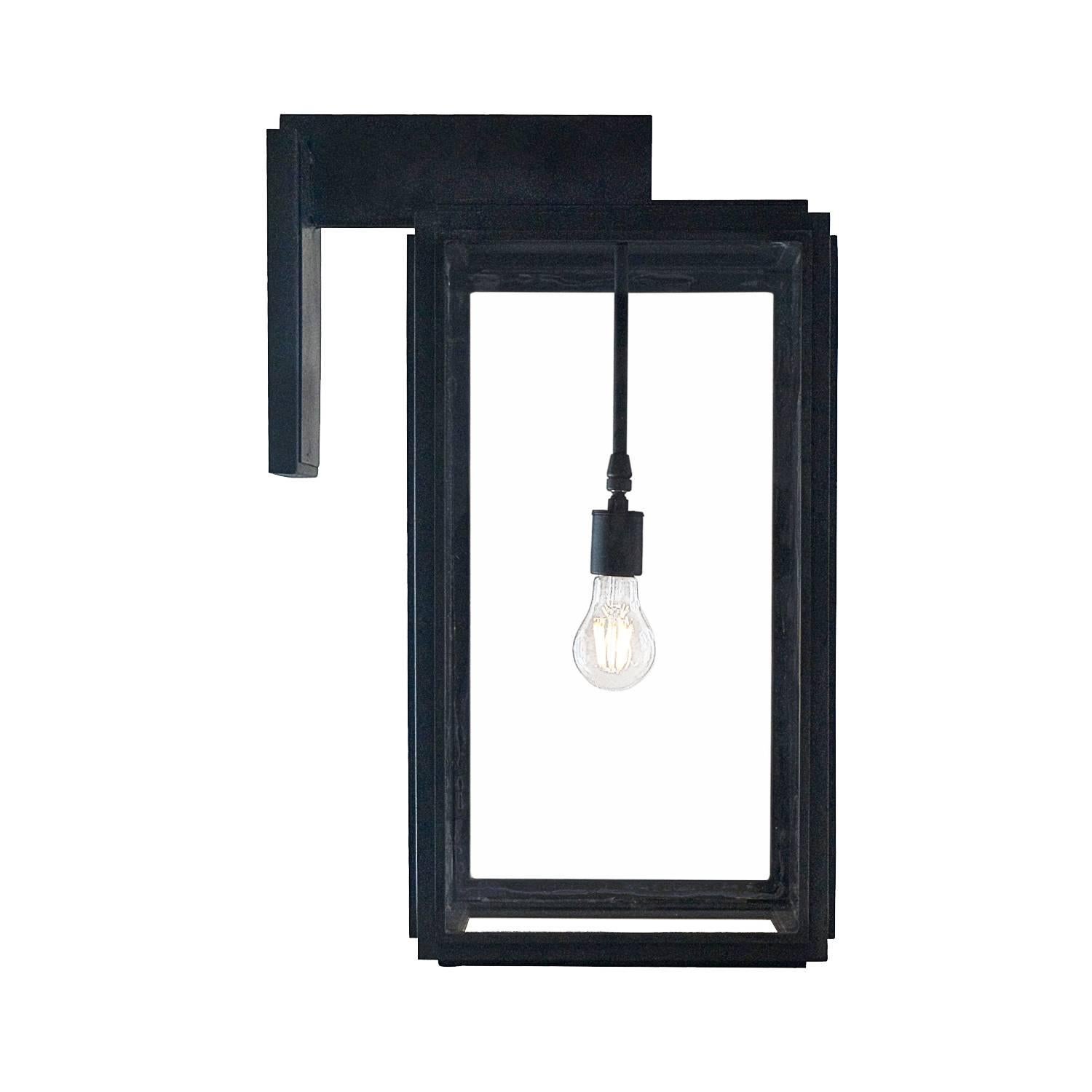 Offering a streamline contemporary design the Bel Air lantern was inspired by a Classic modern estate in Bel Air. It incorporates a modern look with a modern day handmade quality.

Lantern shown in SBLC Grey Finish with SBLC Clear Glass.