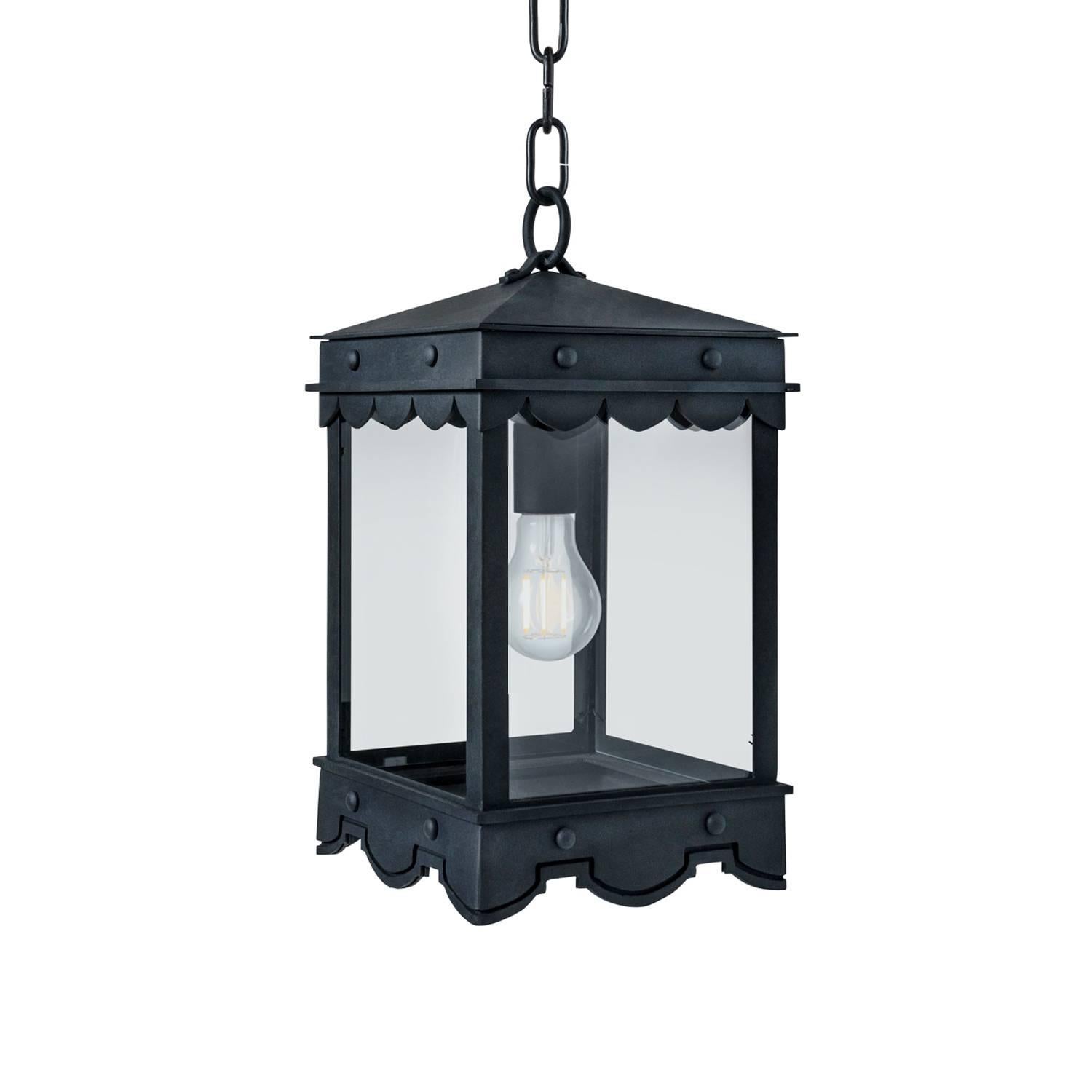 This lantern has Mediterranean style precedence with historic profiles and contemporized geometric lines. A striking fixture during the day but even more so at night when the patterned hem casts intricate shadows.

Canopy dimensions: 5