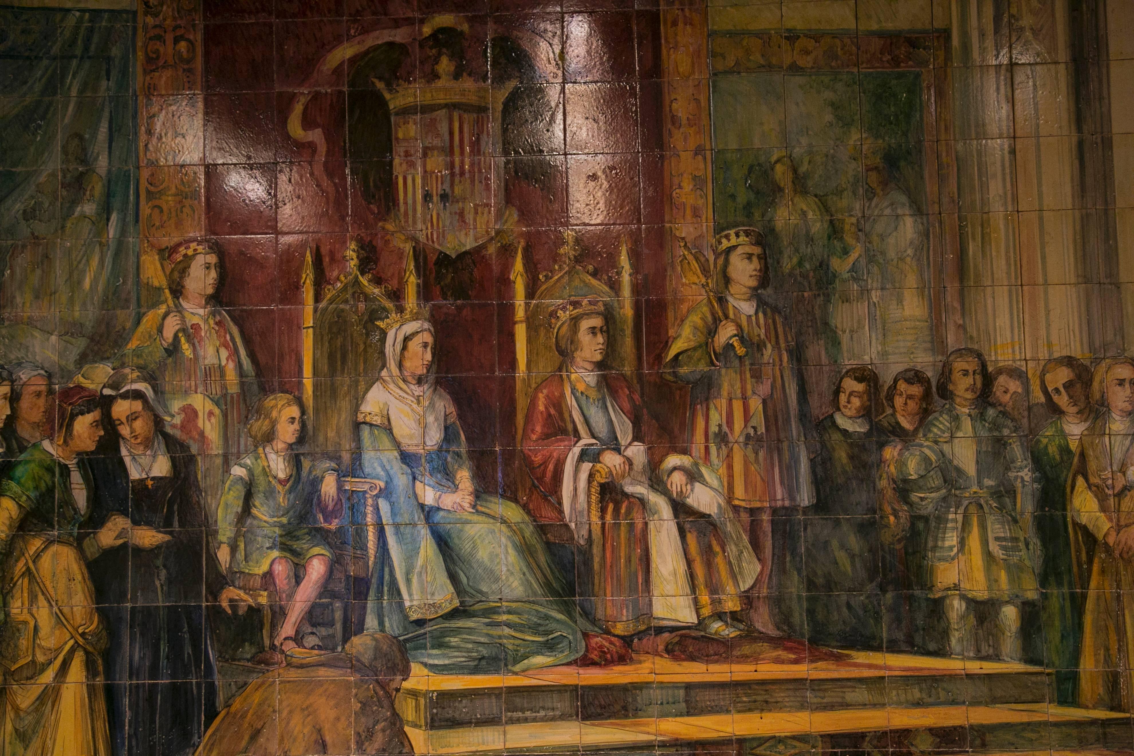 Large tile panel representing Columbus, showing his discoveries in the new world to the sovereigns of Spain, Queen Isabella and Ferdinand of Aragon.

It was made by the ceramist painter manuel corrales from the late 19th century and early 20th