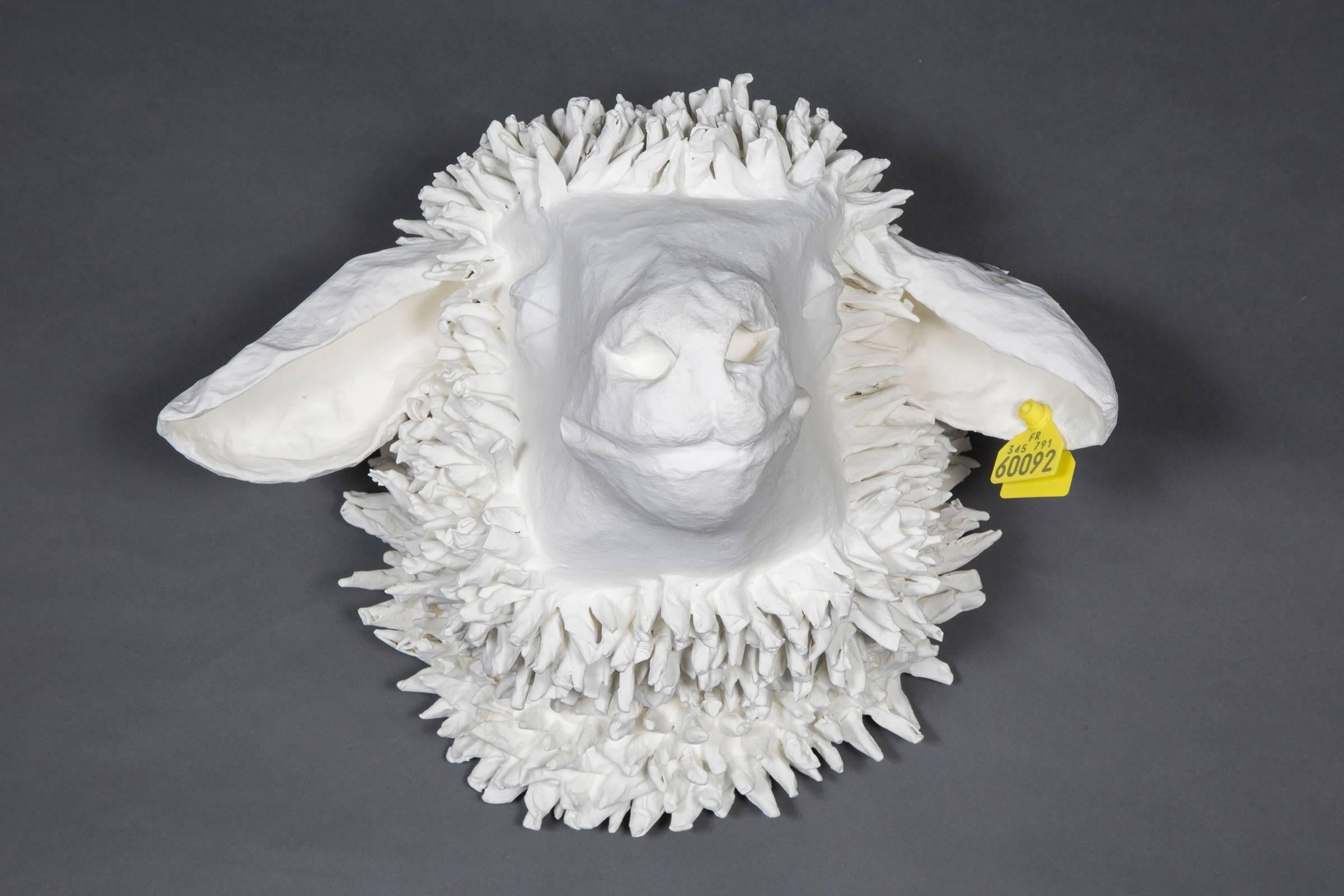 Set of three white sheep heads in papier mâché, from the series 