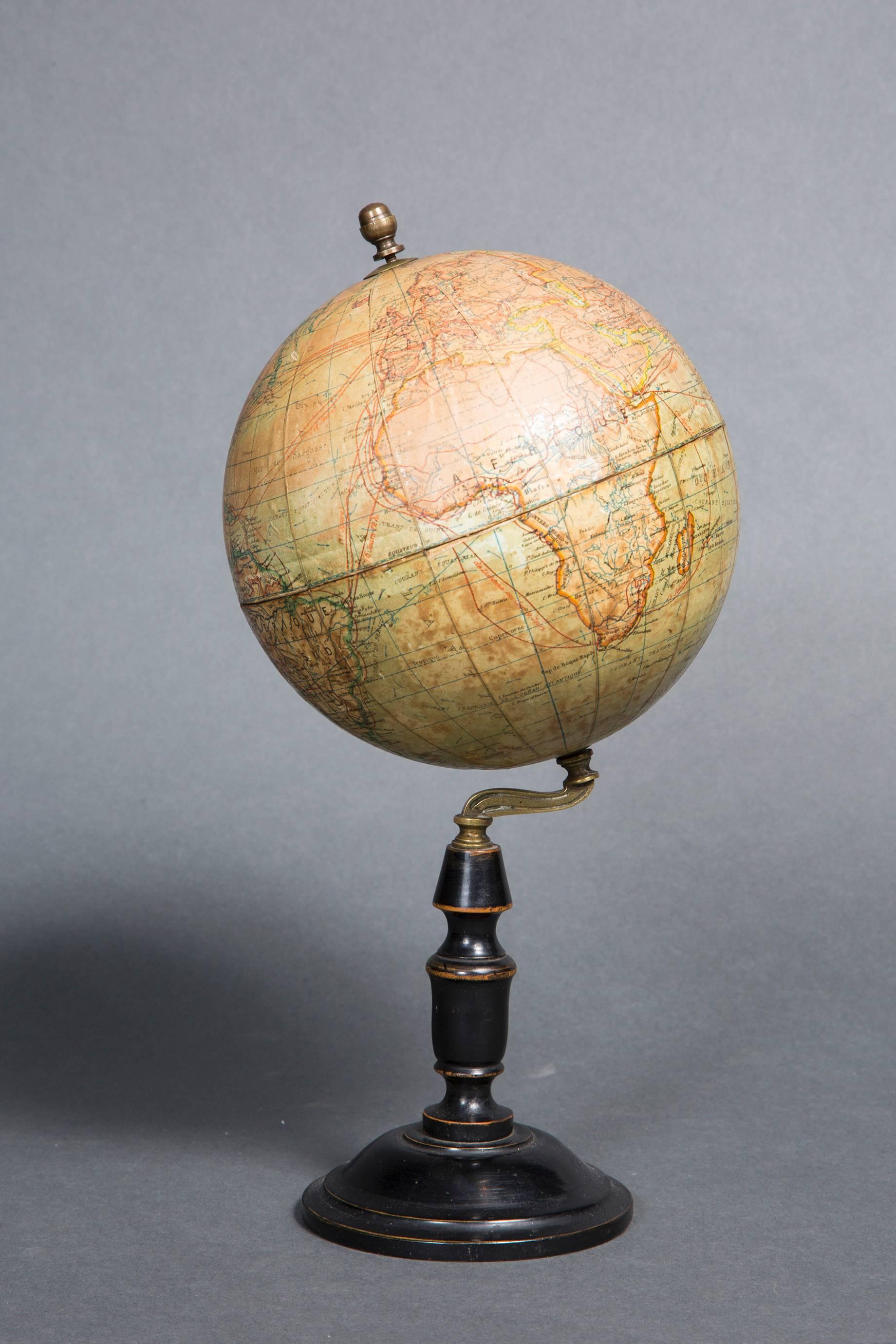 Image 2/3: Earth Sphere by Lebegue & Cie, 30 Rue de Lille Paris, late 19th century Napoleon III mounted on a ebonized blackened wood stand.
Lebègue J. & Cie was a famous Brussels publishing house in the 19th century who then opened a sales office
