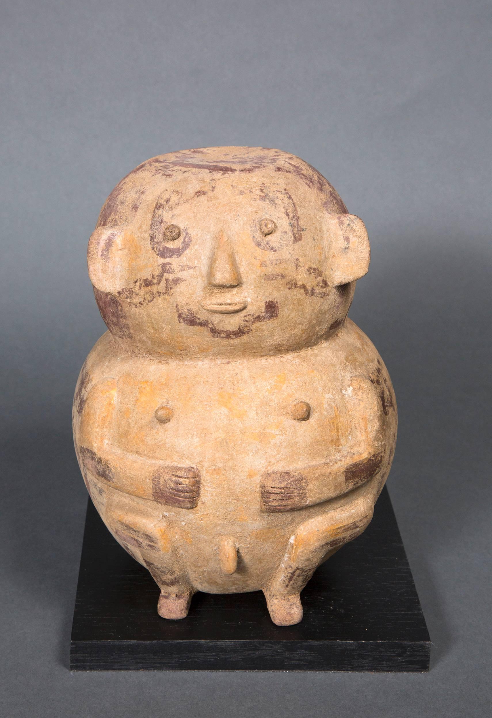 Very rare funeral anthropomorphic urn in polychrome clay, representing a male seated figure. Members are embossed and an entanglement marks the neck.
Sold with a certificate of scientific TL (see photo).
The average age of the last heating of