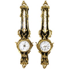 Pair of French 19th Century Louis XV Style Ebonized Cartel Clock and Barometer